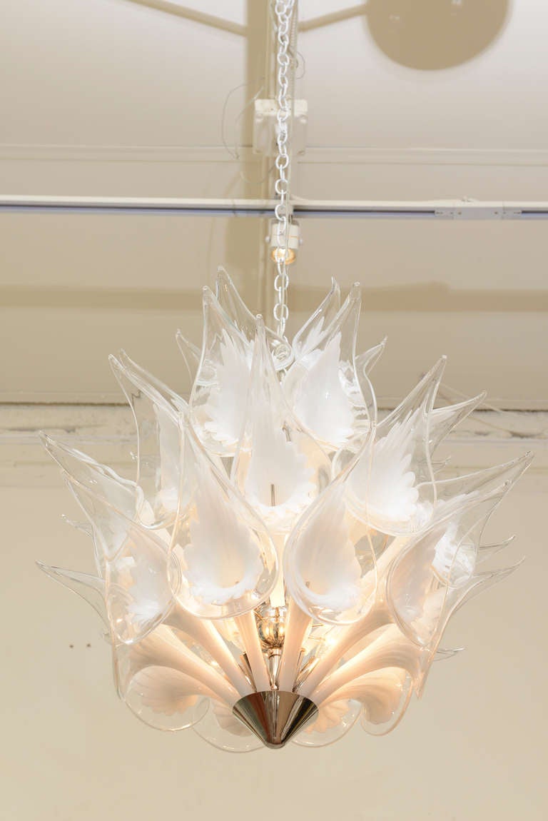 Stunning calla lily hand blown Kalmar glass flowers protrude in abundance and give this wonderful Italian Murano vintage chandelier great presence and a great shape and form. The glass chandelier itself is 36