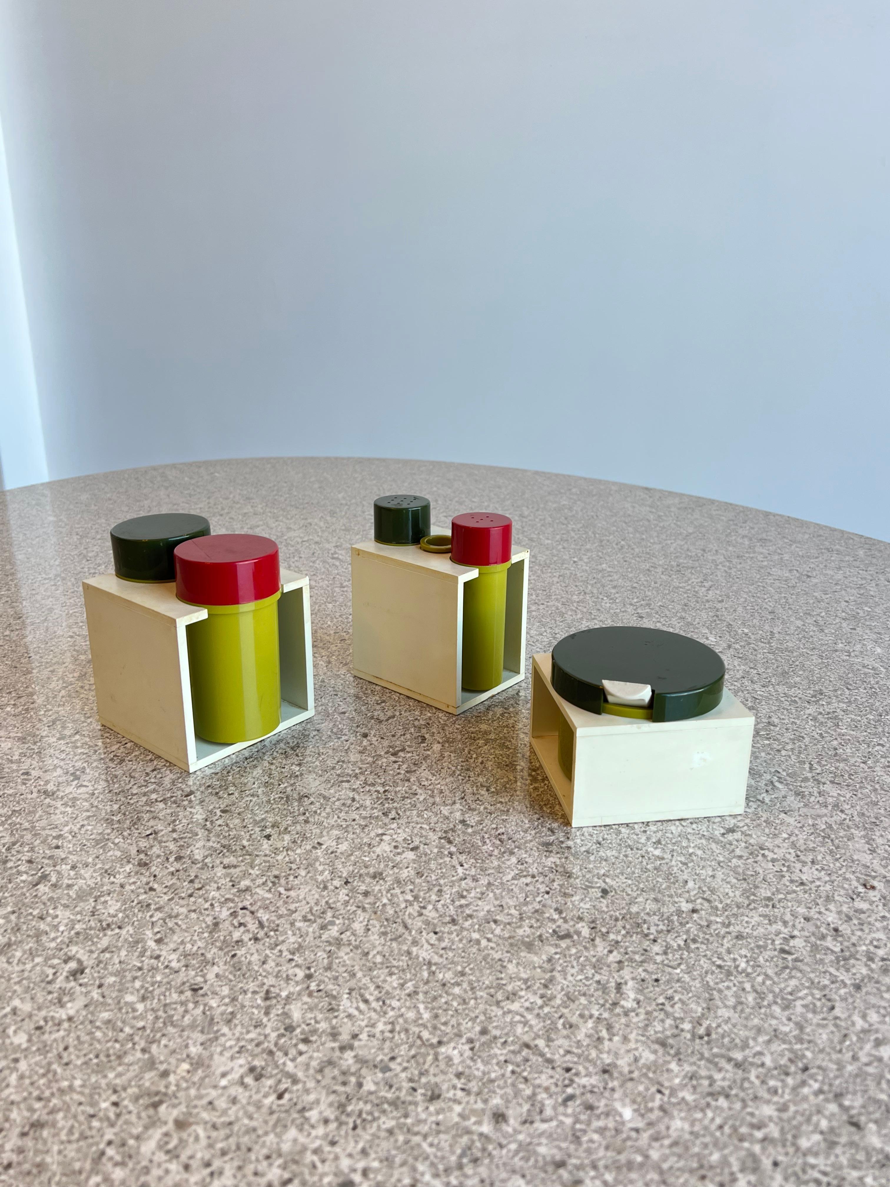 Unique Italian kitchen set from Desco Al Ma Rose Design by A. Salviato 1960s.
Olive oil and balsamic containers. Salt and pepper containers. Sugar container.