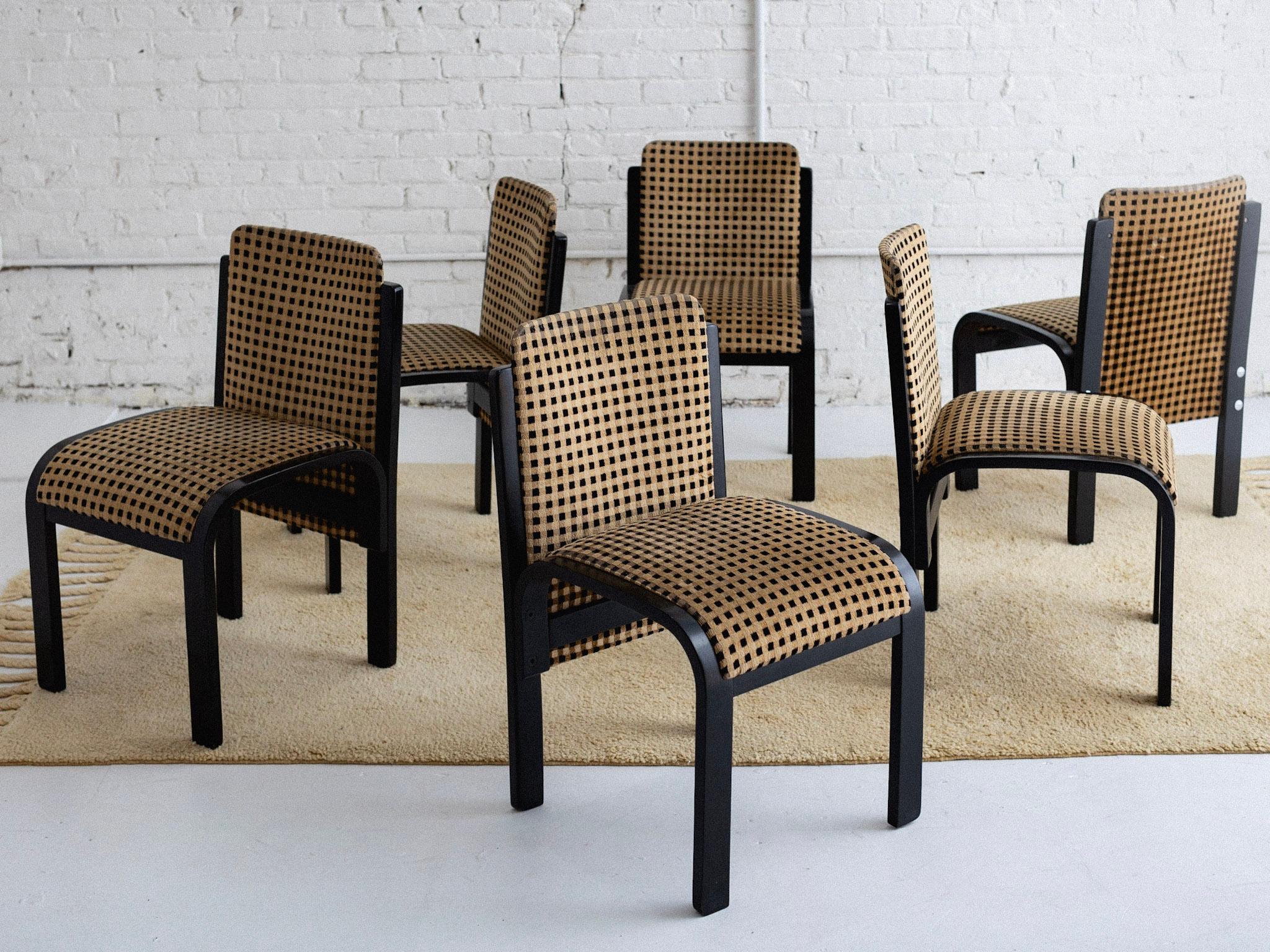 A set of six mid century Italian dining chairs. Black lacquered bentwood with chrome hardware. Original geometric patterned velvet. Reupholstery is recommended but not required. Sourced in Northern Italy.