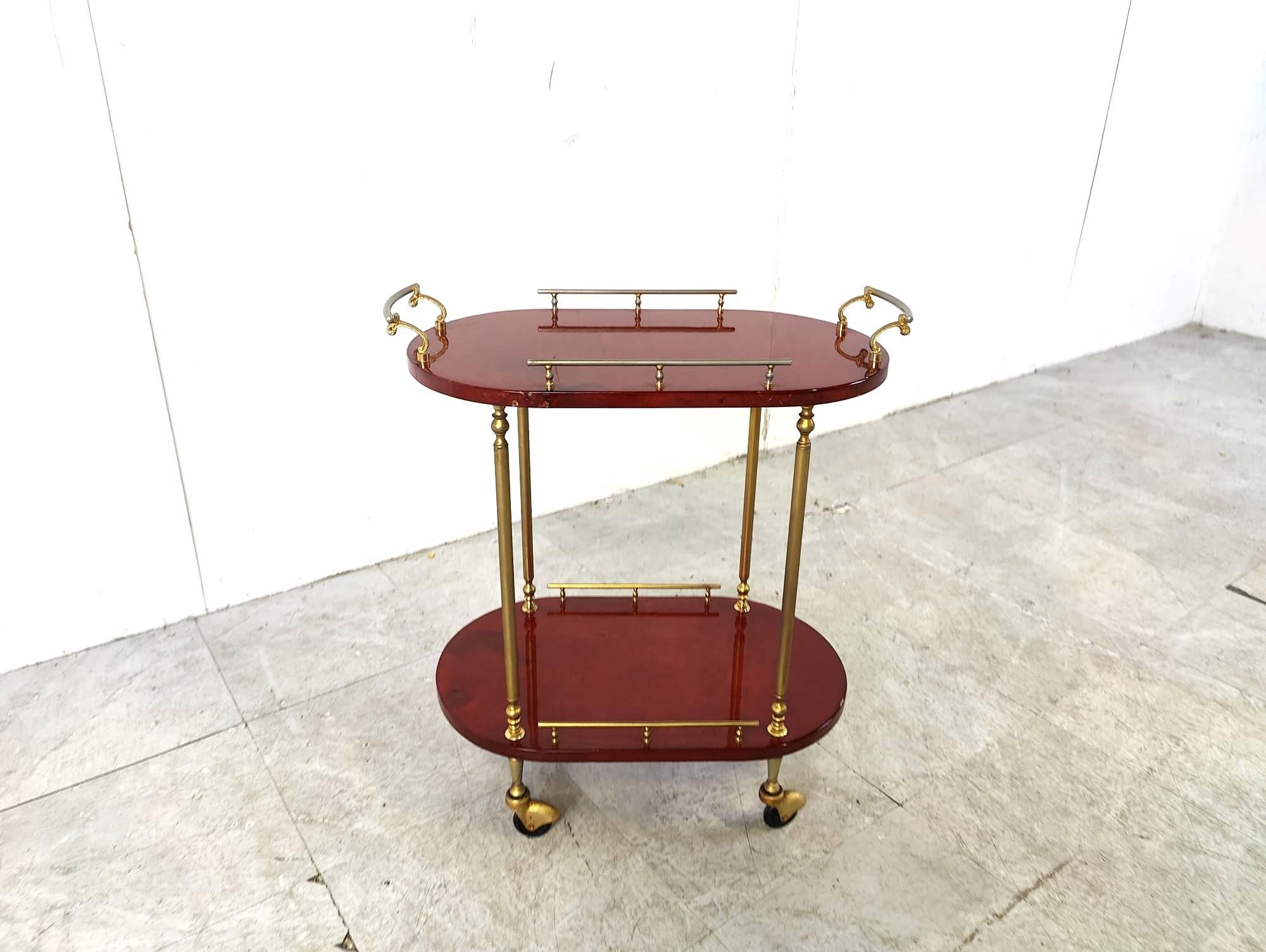 Very rare Aldo Tura Goatskin or parchment bar cart. This bar cart was made in Italy in the 1960s. 

Constructed of lacquered goatskin / parchment and gilt metal hardware.

Good condition.

1960s - Italy

Dimensions:
Height: 60cm
Width: 54cm
Depth: