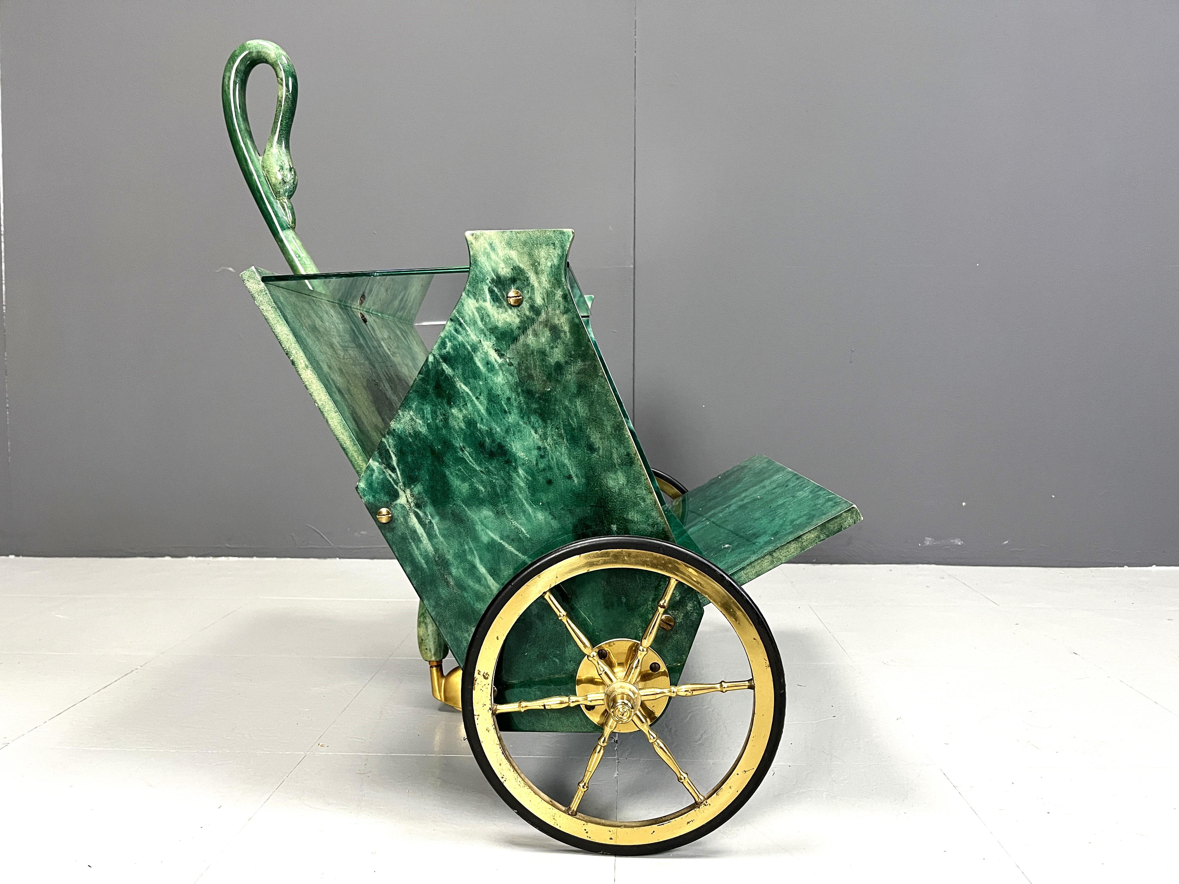Very rare Aldo Tura swan shaped Goatskin or parchment bar cart. This bar cart was made in Italy in the 1960s. 

Constructed of lacquered goatskin / parchment and brass hardware. 

Great decorative appeal with a fantastic vibrant green colour.

Good