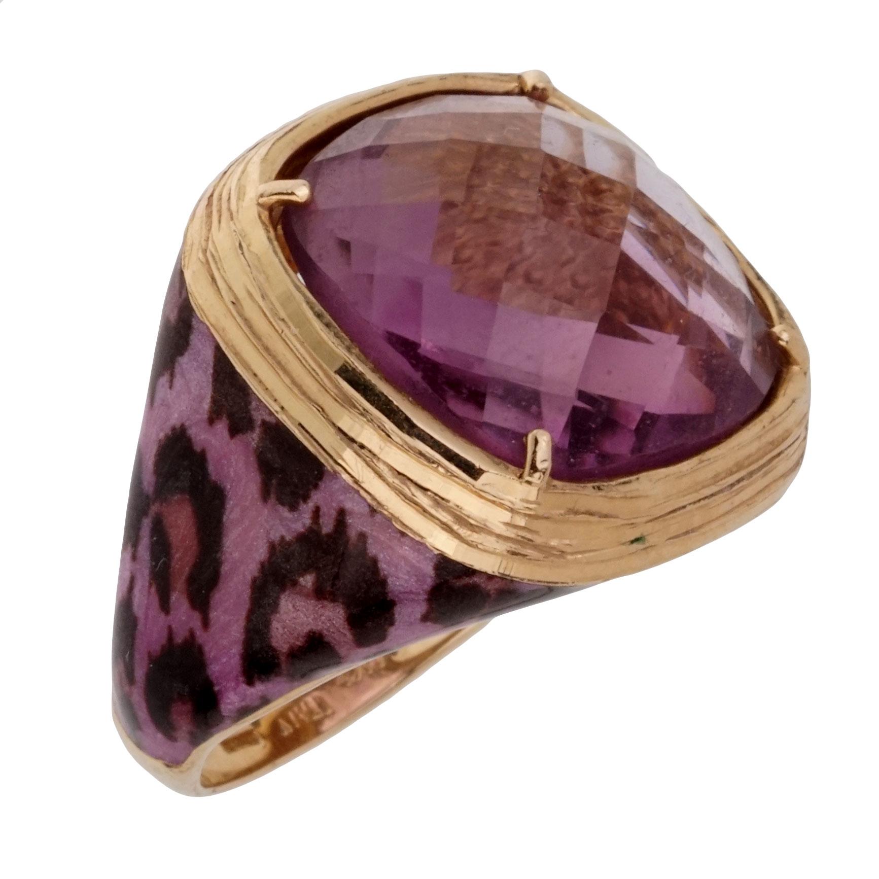 A fabulous cocktail ring showcasing a stepcut Amethyst stone surrounded by incredible enamel work in the form of a cheetah spots in 14k yellow gold.

Size 6 1/4 Resizeable