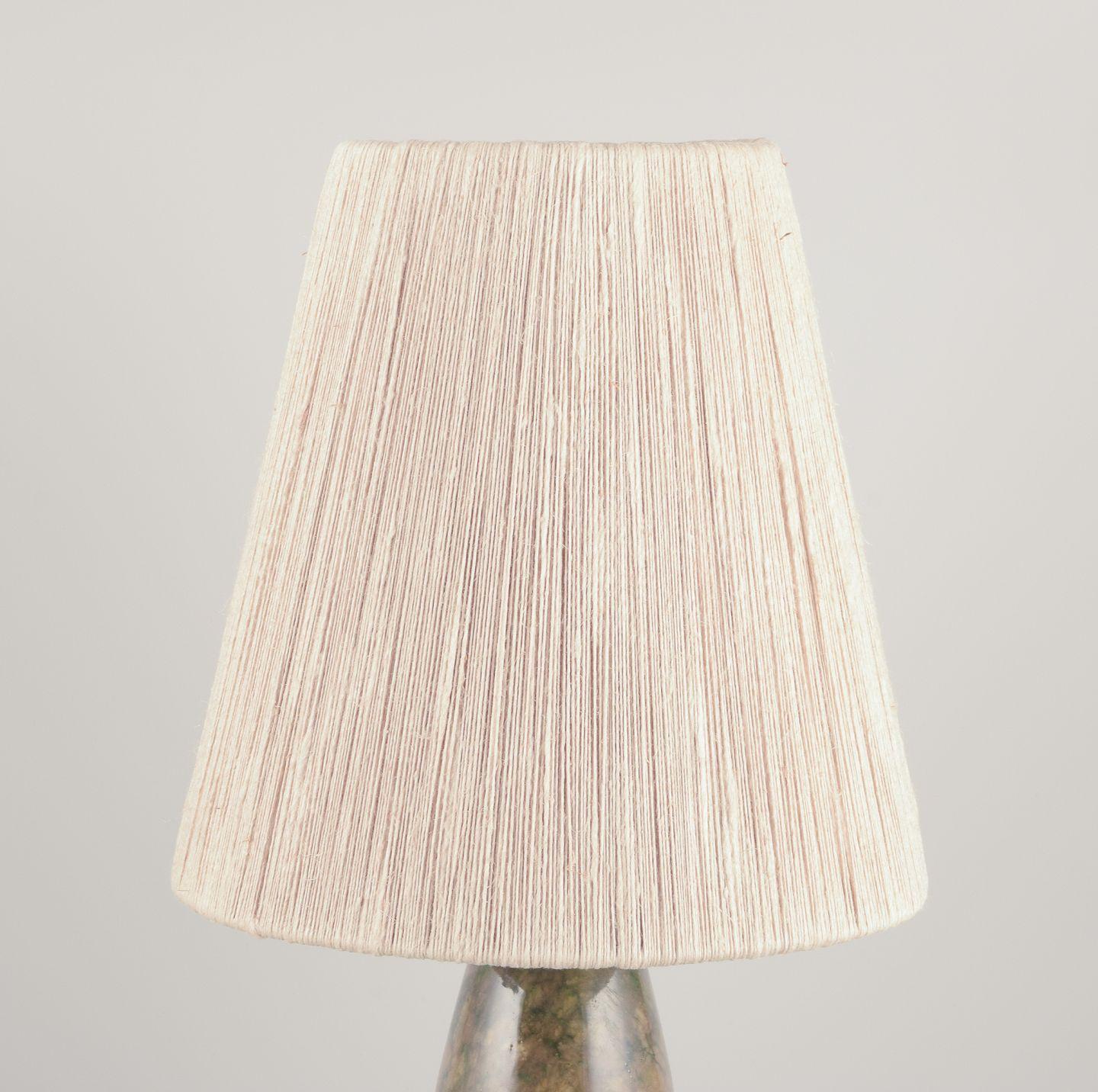 Pre-owned goods are exempt from import duties for U.S. customers. 
Therefore, no import tariffs will be applicable to your purchase.

Italian lamp manufacturer.
Tall and slender table lamp in alabaster with a cotton thread shade.
Greenish tones.