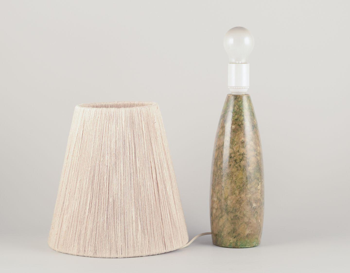 Italiano Italian lamp manufacturer. Tall and slender table lamp in alabaster. in vendita