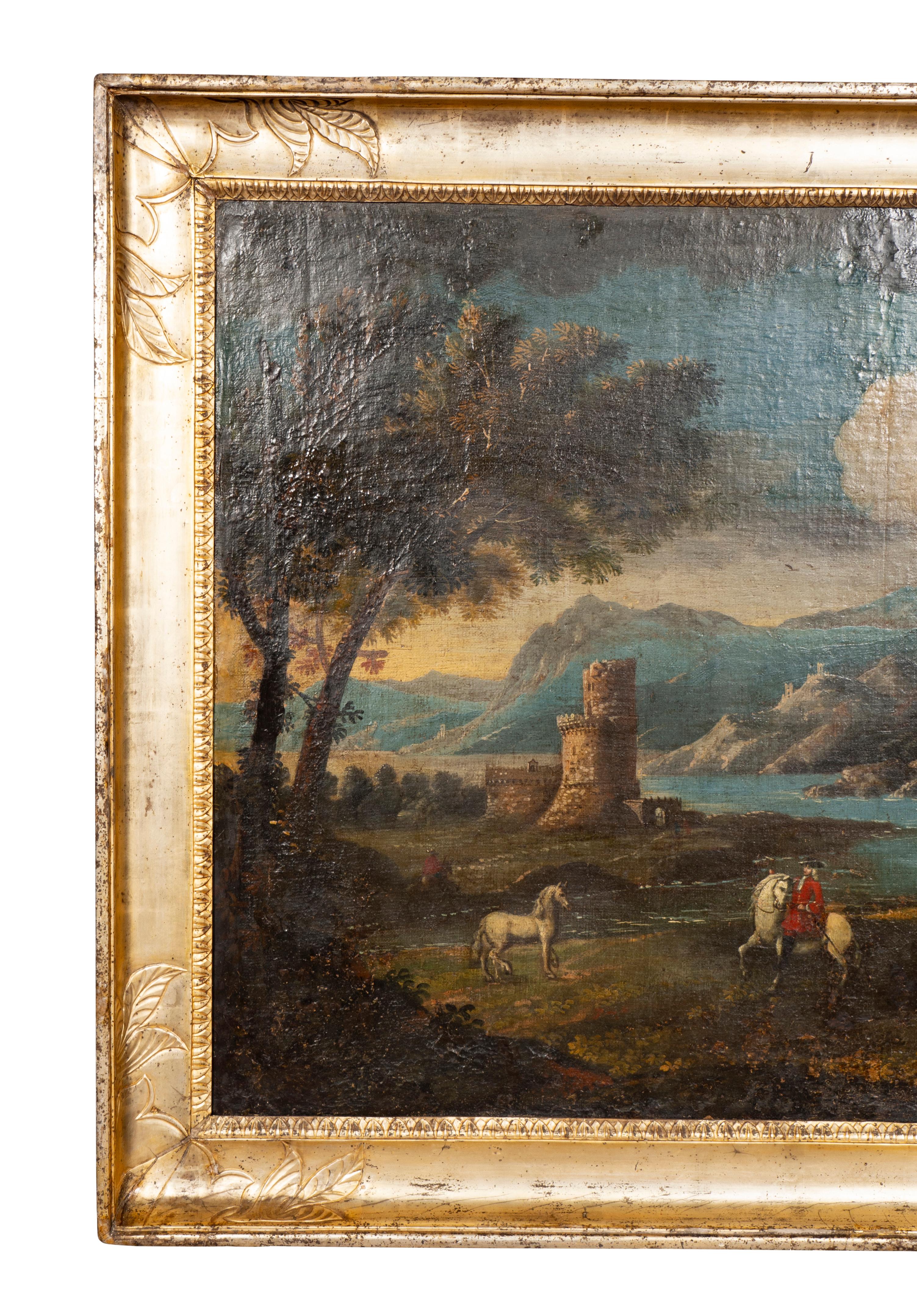 The oil on canvas depicting an ocean bay with castle ruin and man on horseback with red jacket. Farm animals and waterfall. Estate of William Hodgins. Boston Mass. Silver leaf carved wood frame.
