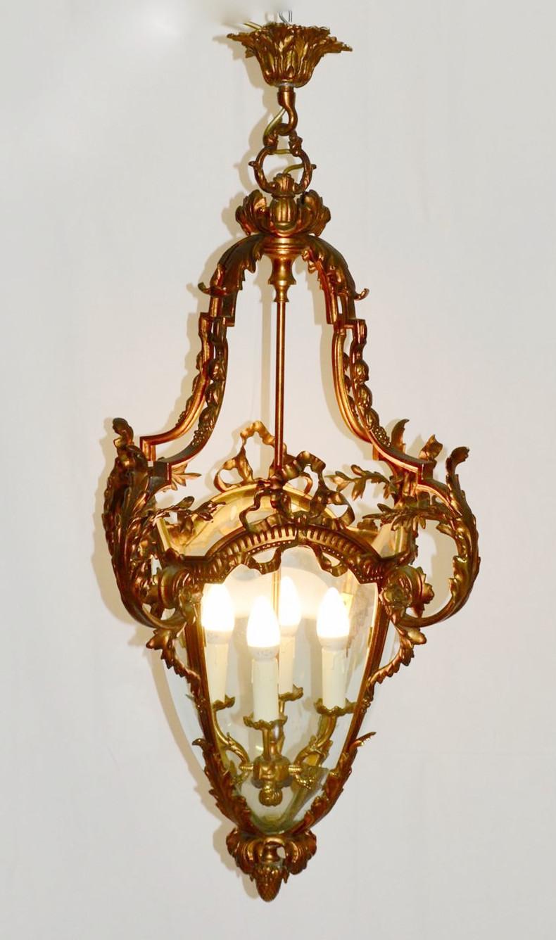 Italian ornate antique gilt bronze lantern / Made in Italy circa 1930’s
4 lights / E14 type / max 40W each
Height: 39.5 inches / Diameter: 15.5 inches 
1 in stock in Italy
Order Reference #: FABIOLTD E108