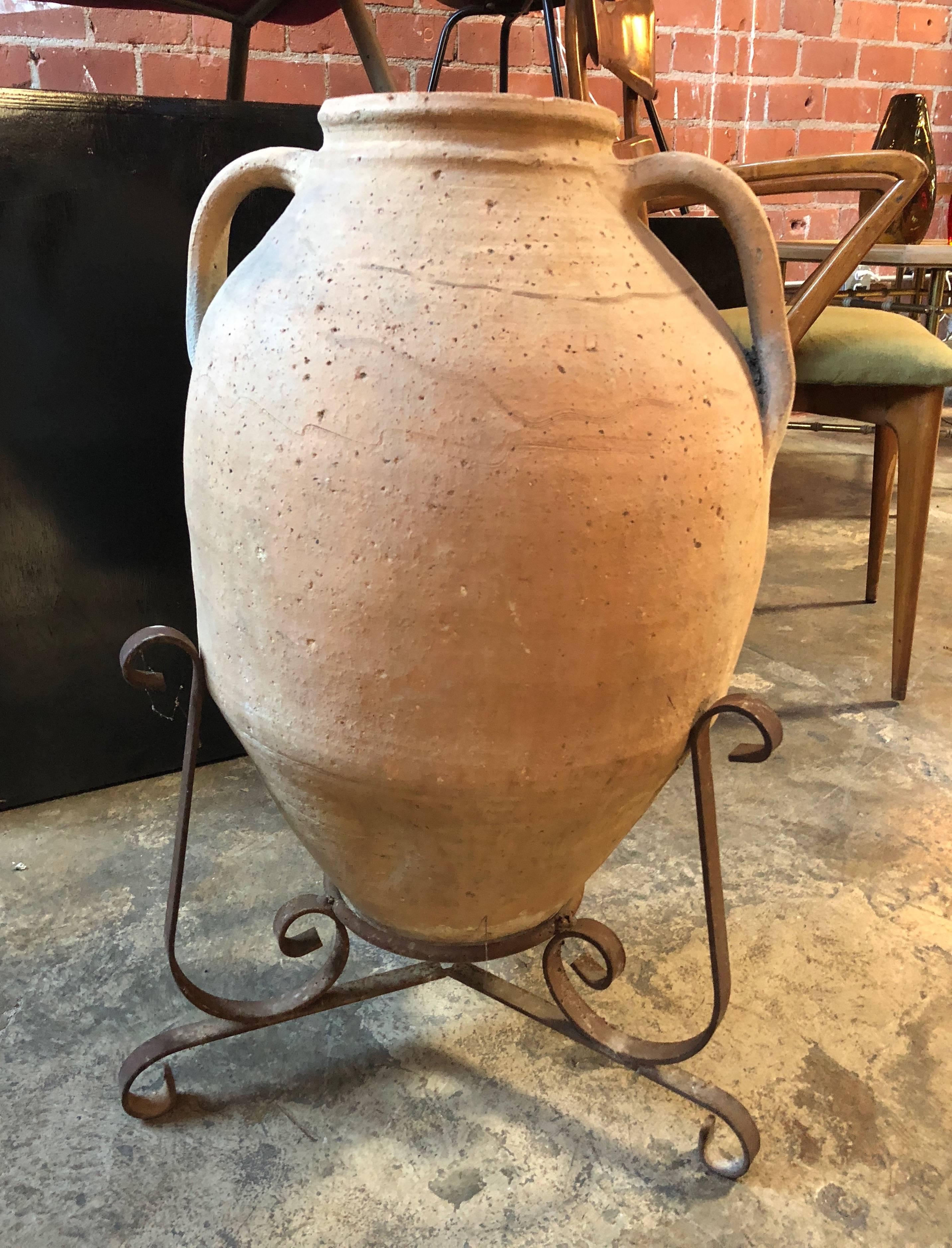 This impressive late 18th century terracotta water jar was found in Puglia (South of Italy).
In excellent condition and with great character, this jar once had a nice metal base and served as the water source for a 