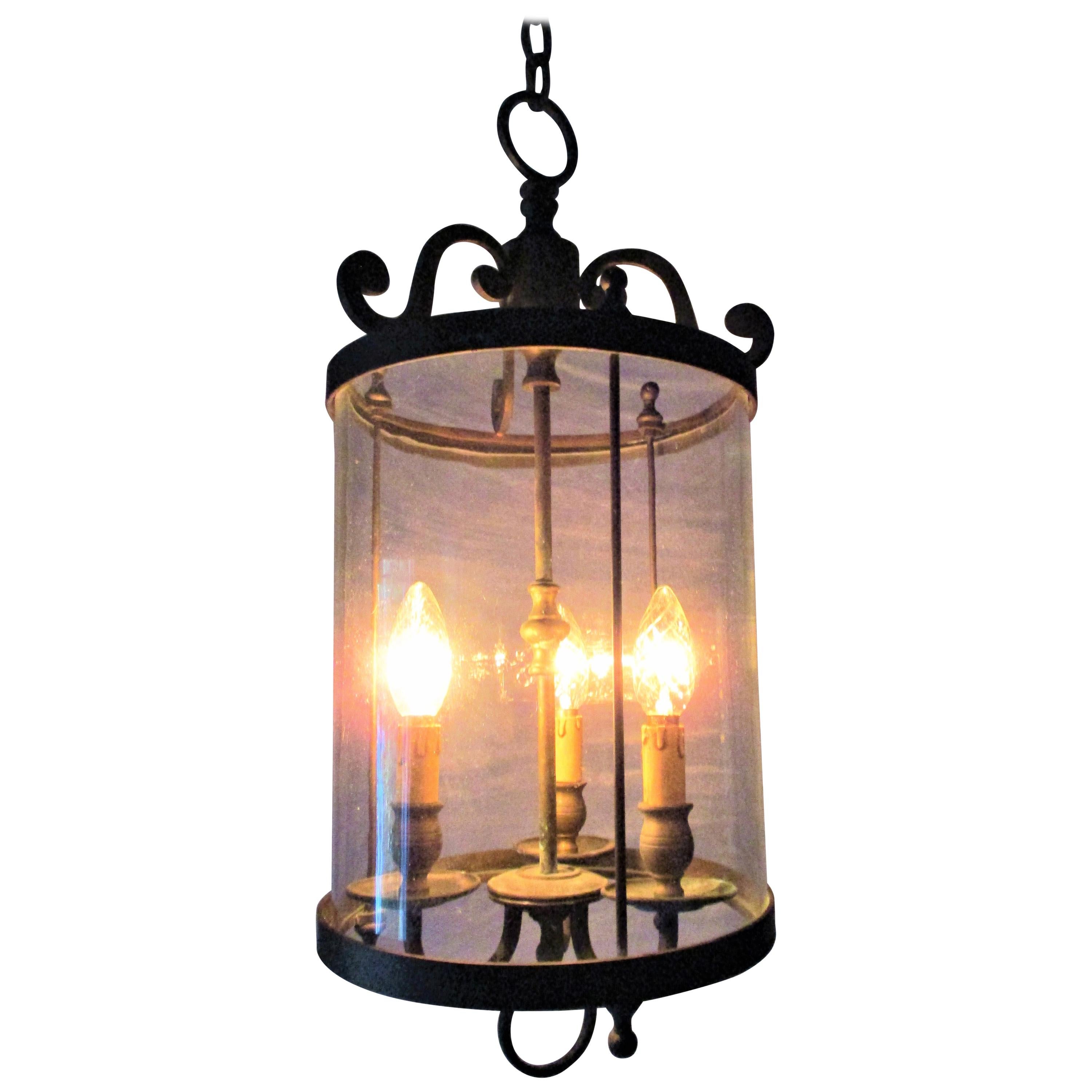 Gorgeous large Italian brass cylindrical lantern with original bubble glass cylinder.