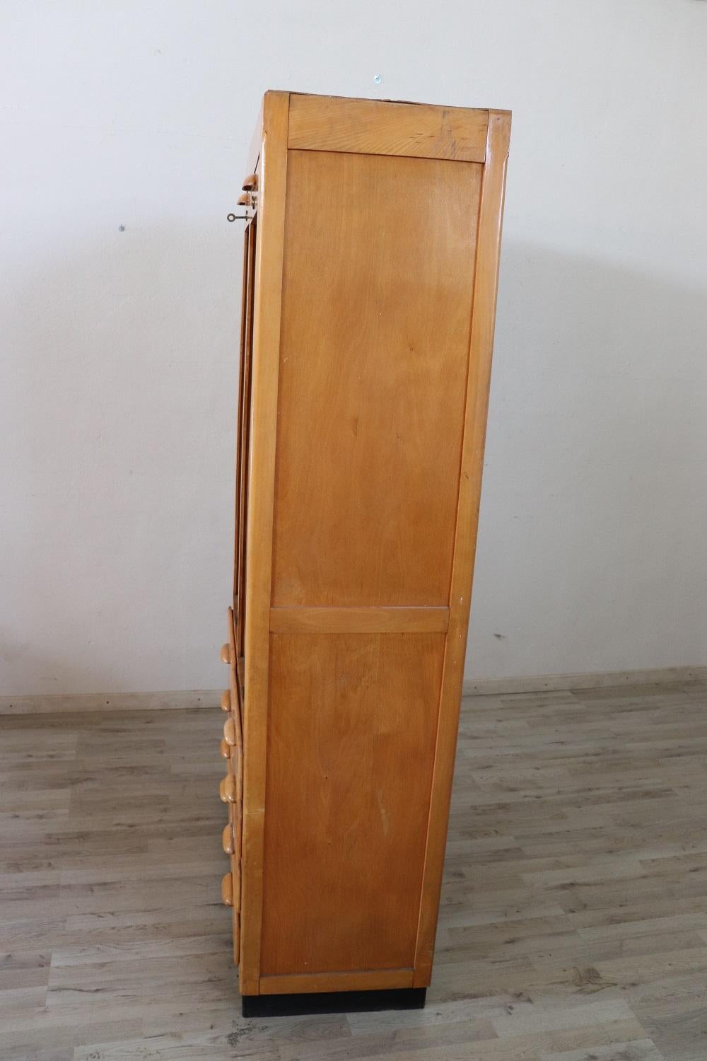 Italian Large Apothecary Cabinet with Handmade Sliding Shutter Doors, 1940s For Sale 6