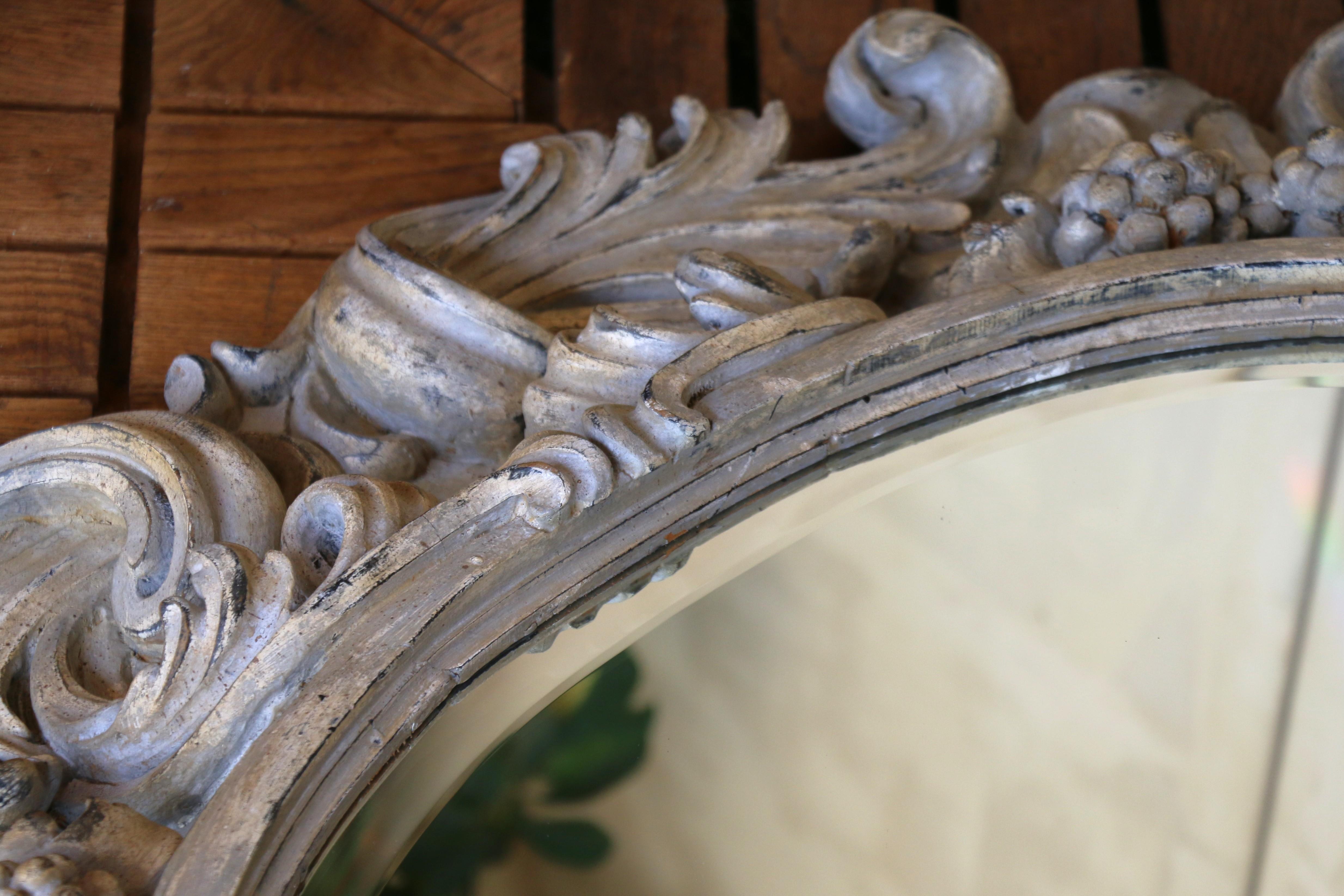 Italian Large Deeply Carved Wooden Oval Mirror With Beveled Glass, Circa 1980s For Sale 11
