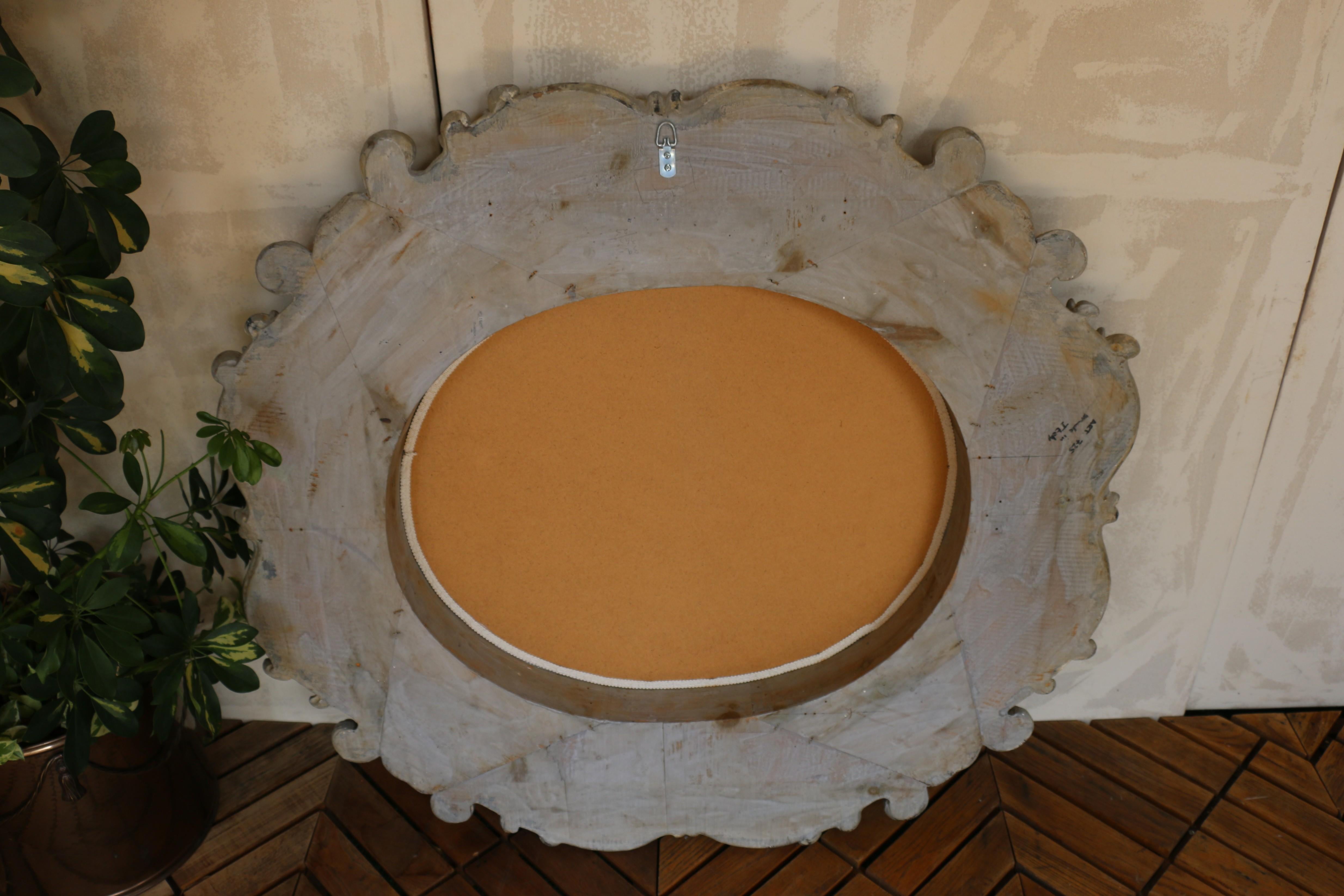 Italian Large Deeply Carved Wooden Oval Mirror With Beveled Glass, Circa 1980s For Sale 13