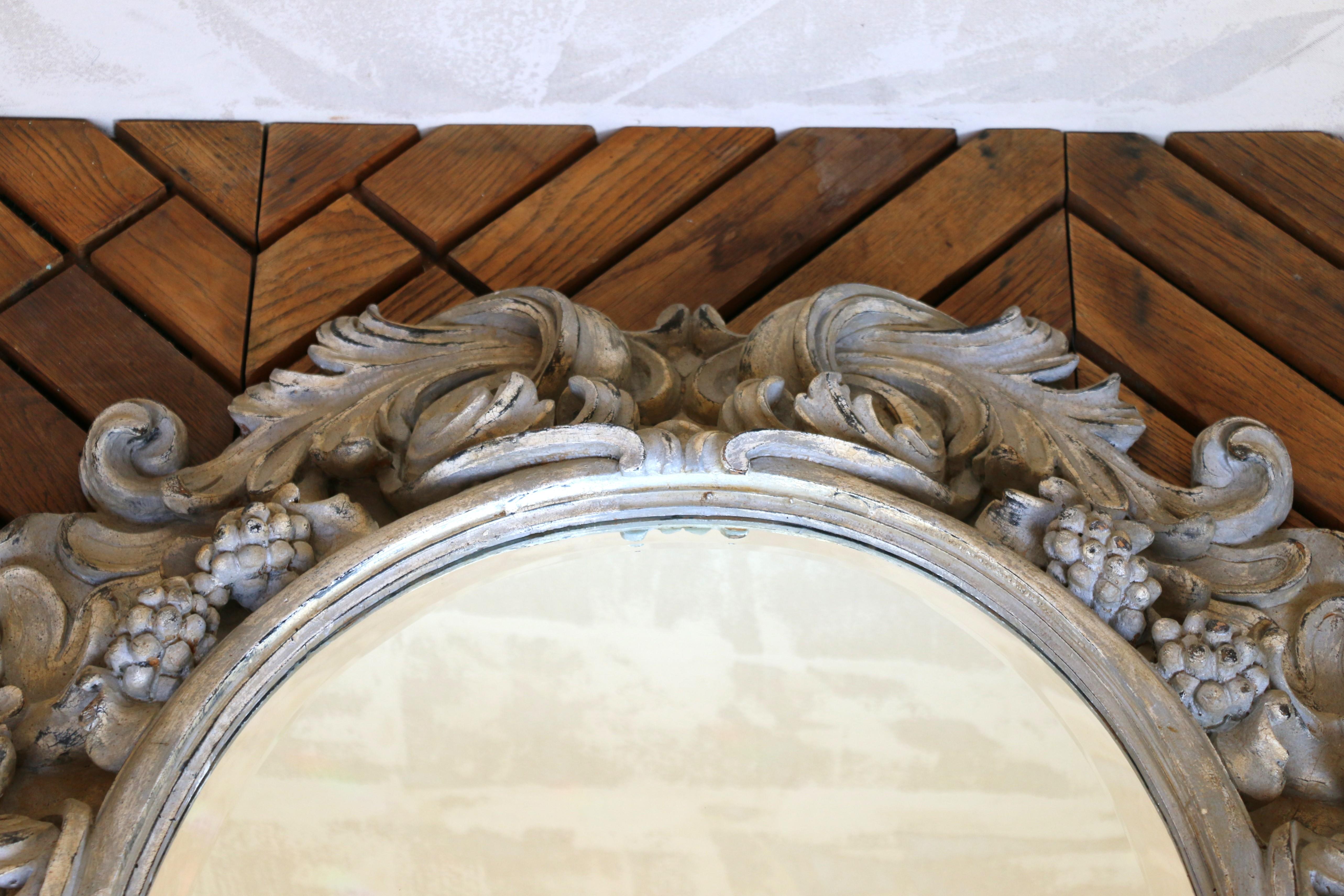 Italian Large Deeply Carved Wooden Oval Mirror With Beveled Glass, Circa 1980s For Sale 1