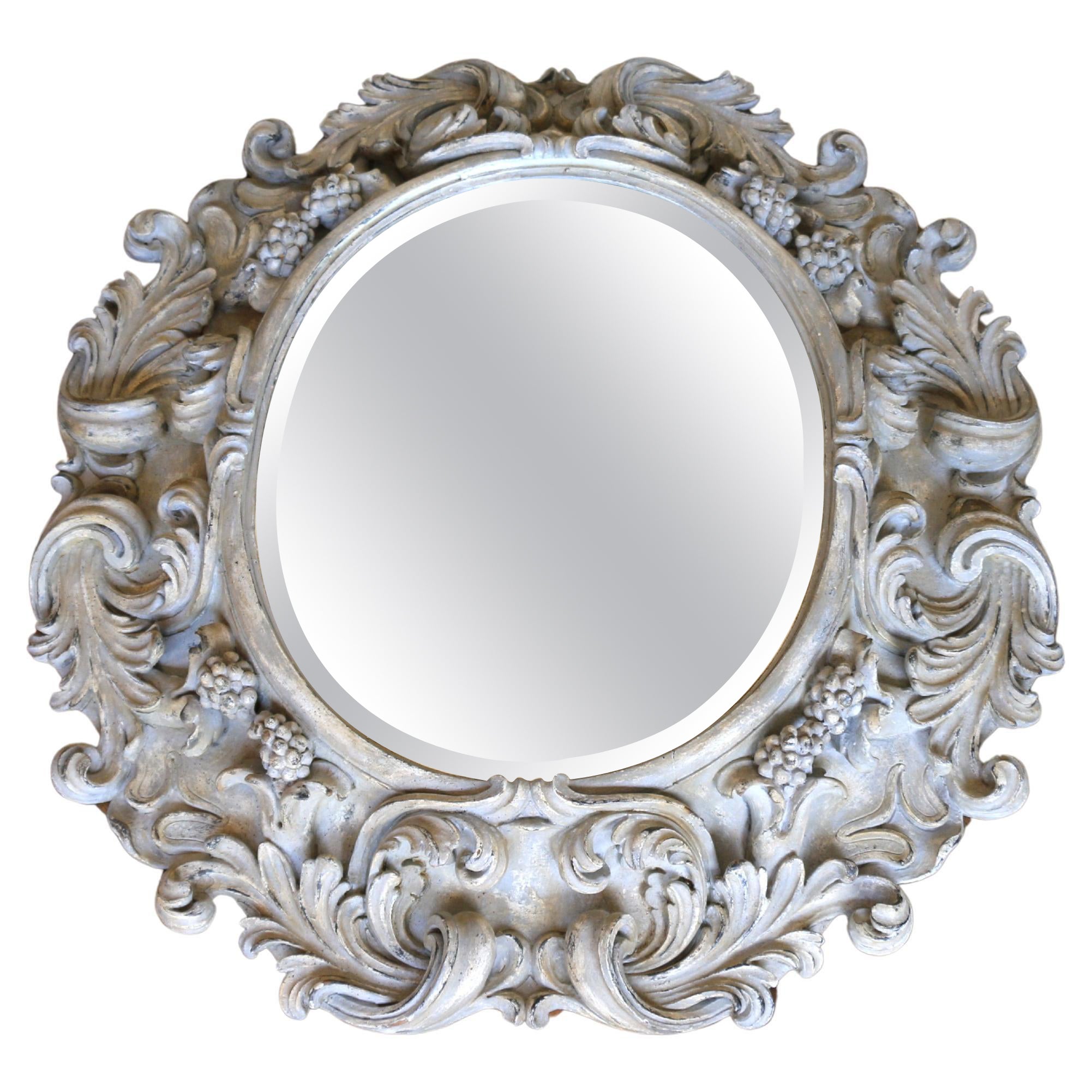 Italian Large Deeply Carved Wooden Oval Mirror With Beveled Glass, Circa 1980s For Sale