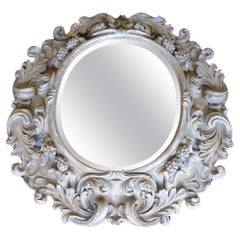 Italian Large Deeply Carved Wooden Oval Mirror With Beveled Glass, Circa 1980s