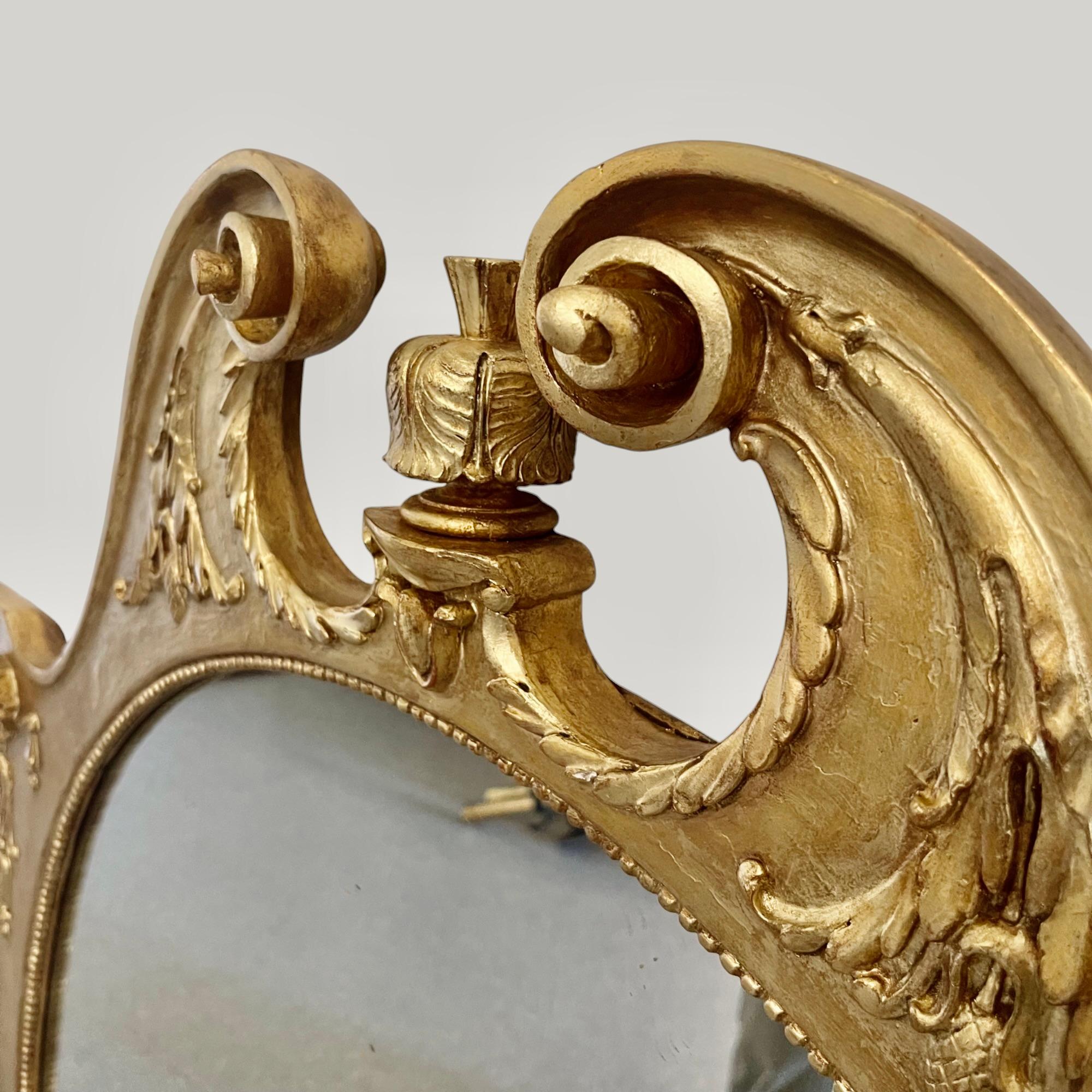 A dramatic, large giltwood mirror dating from 1940's