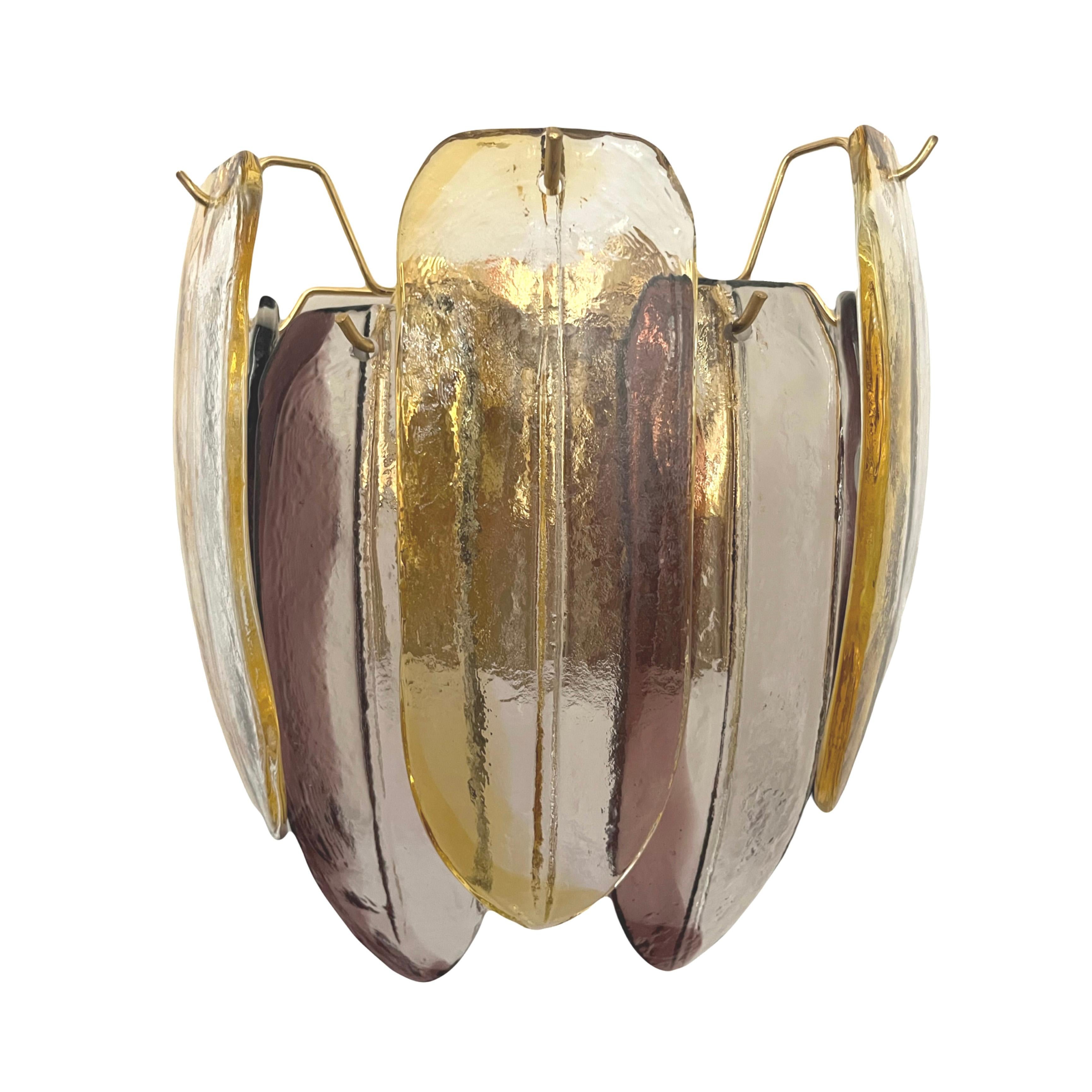Marvelous and unique Pair of Italian Murano glass Wall Sconces from 1980s. These fixtures were designed and munufactured during the 1980s in Italy by Alfredo Barbini. 
“Barbini” original sticker label from 80s shows on some glasses.
Each Wall Sconce