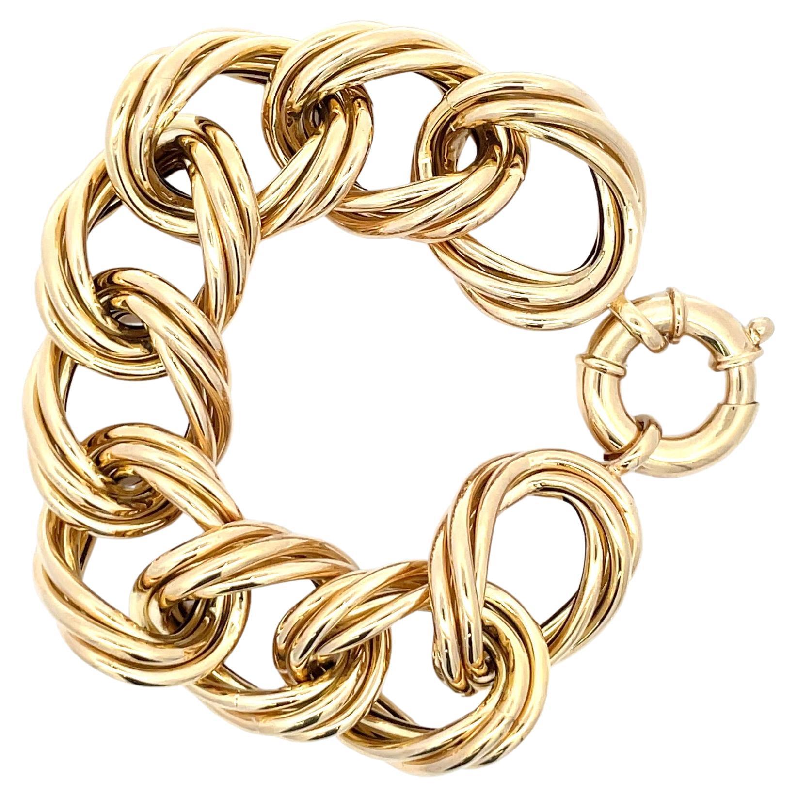 Made in Italy, this 14 Karat Yellow Gold bracelet features 9 oversized links weighing 35.1 grams. 
More link bracelets in stock. 