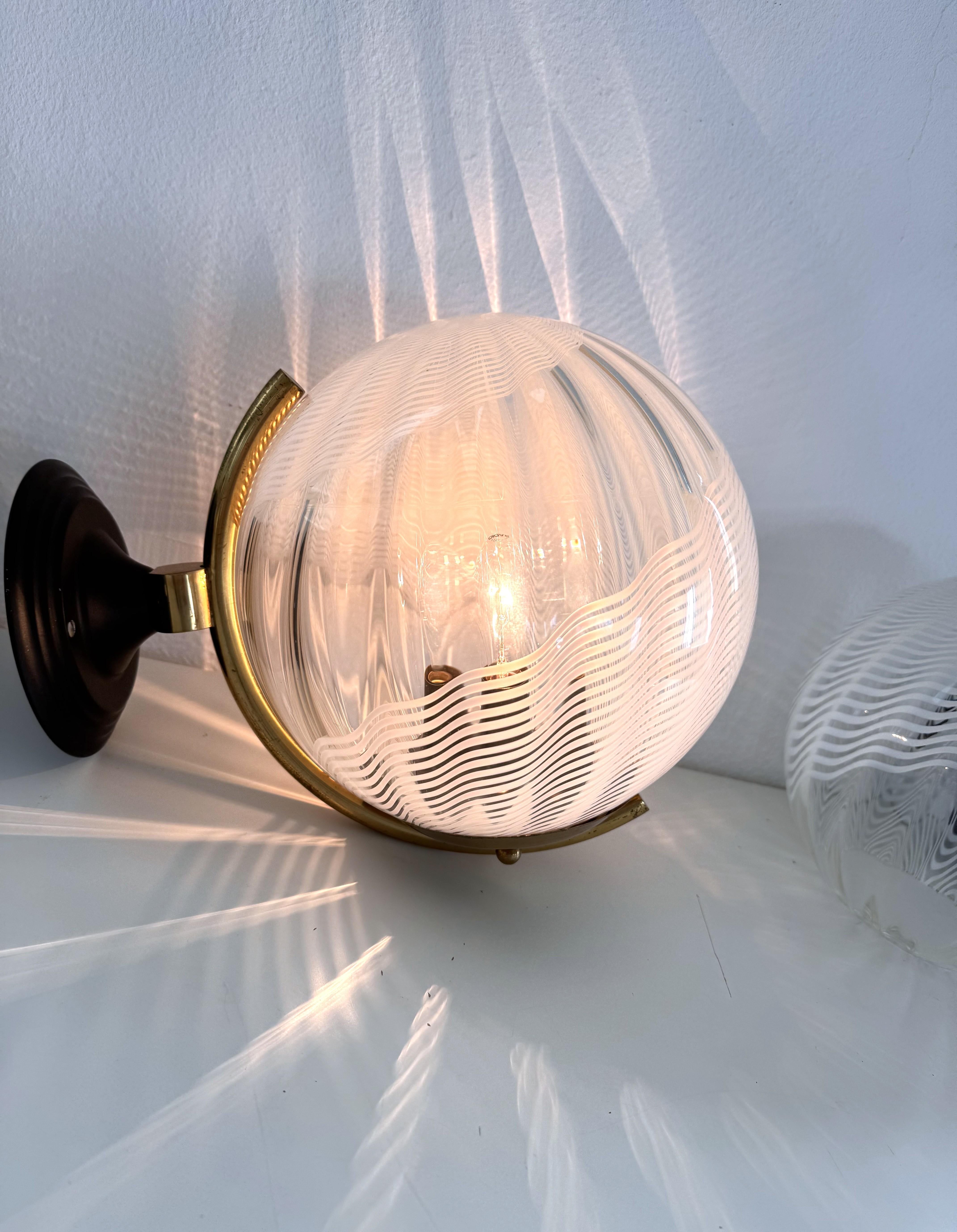 Italian Large Wall Lights with White Striped Wavy Glass Globes, 1970s In Good Condition For Sale In Morazzone, Varese