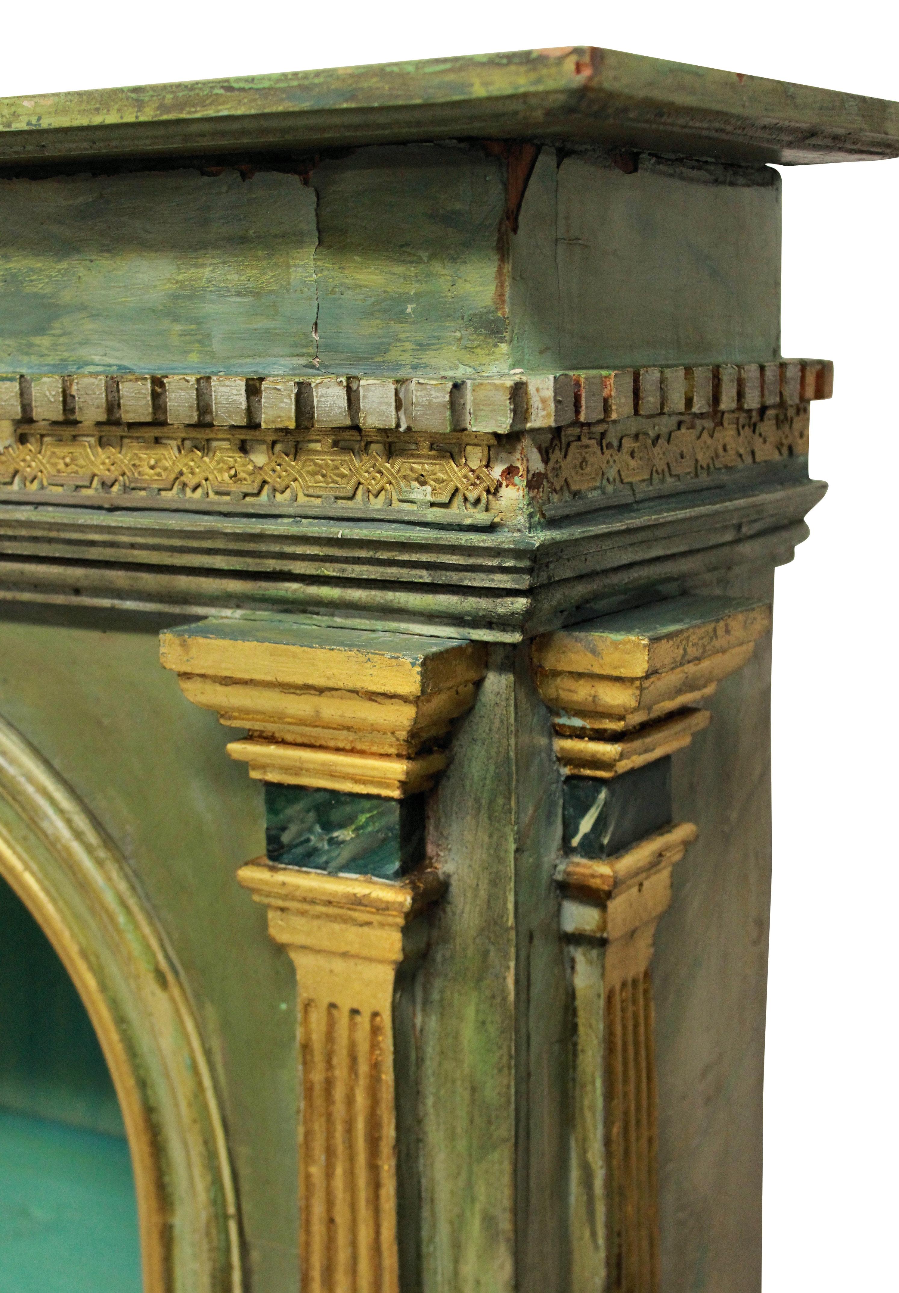An Italian late 18th century curiosity cabinet in a classical manner in faux marble with water gilding. The pediment with a filigree gilt bronze frieze. Later restored and the door formerly glazed.
 
  