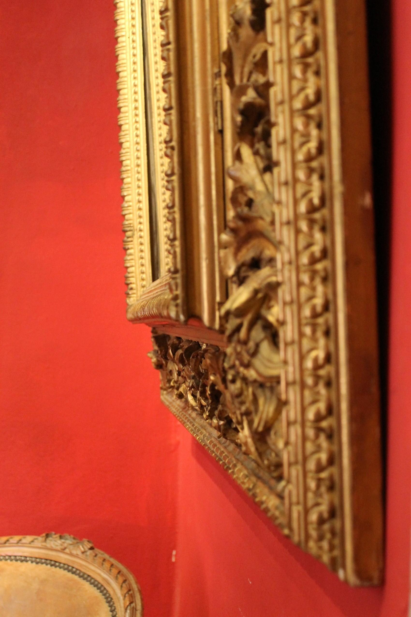 19th Century Italian Louis XVI Style Rectangular Hand Carved Gilt Wood Frame with Mirror