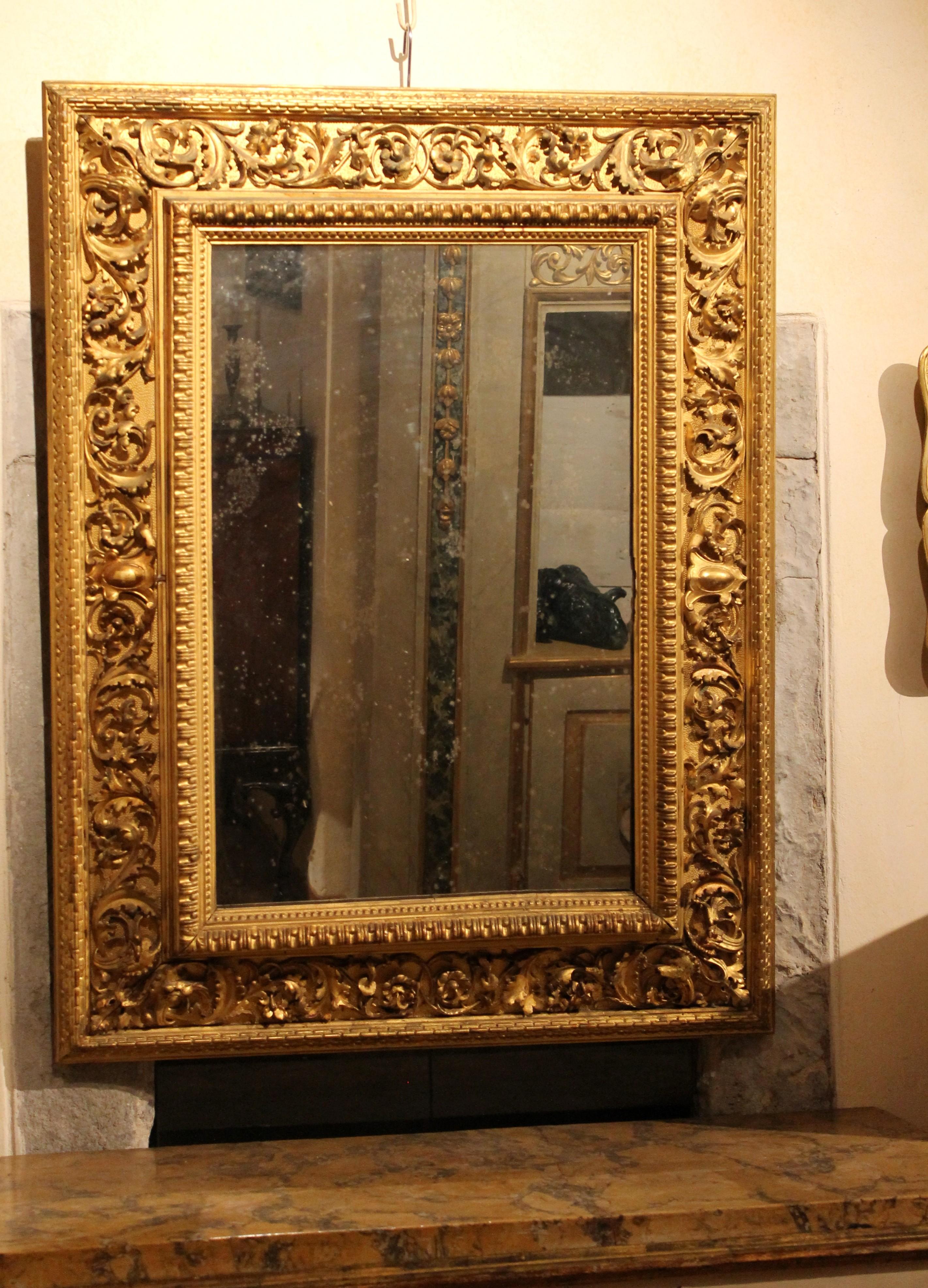 Hand-Carved Italian Louis XVI Style Rectangular Hand Carved Gilt Wood Frame with Mirror