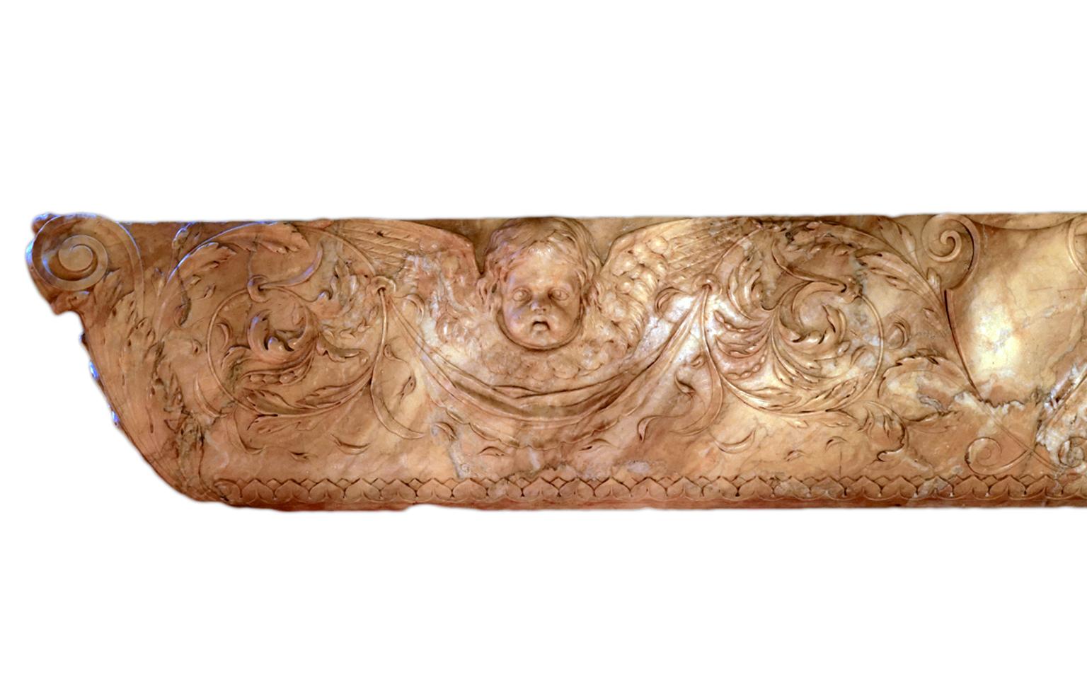 Baroque Italian Late 18th Century Sienna Mantel Console Carved with Putti and Leaf Work