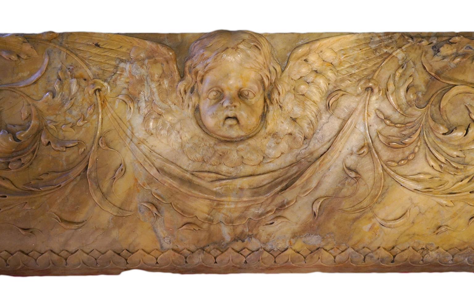 Italian Late 18th Century Sienna Mantel Console Carved with Putti and Leaf Work In Good Condition In Ft. Lauderdale, FL