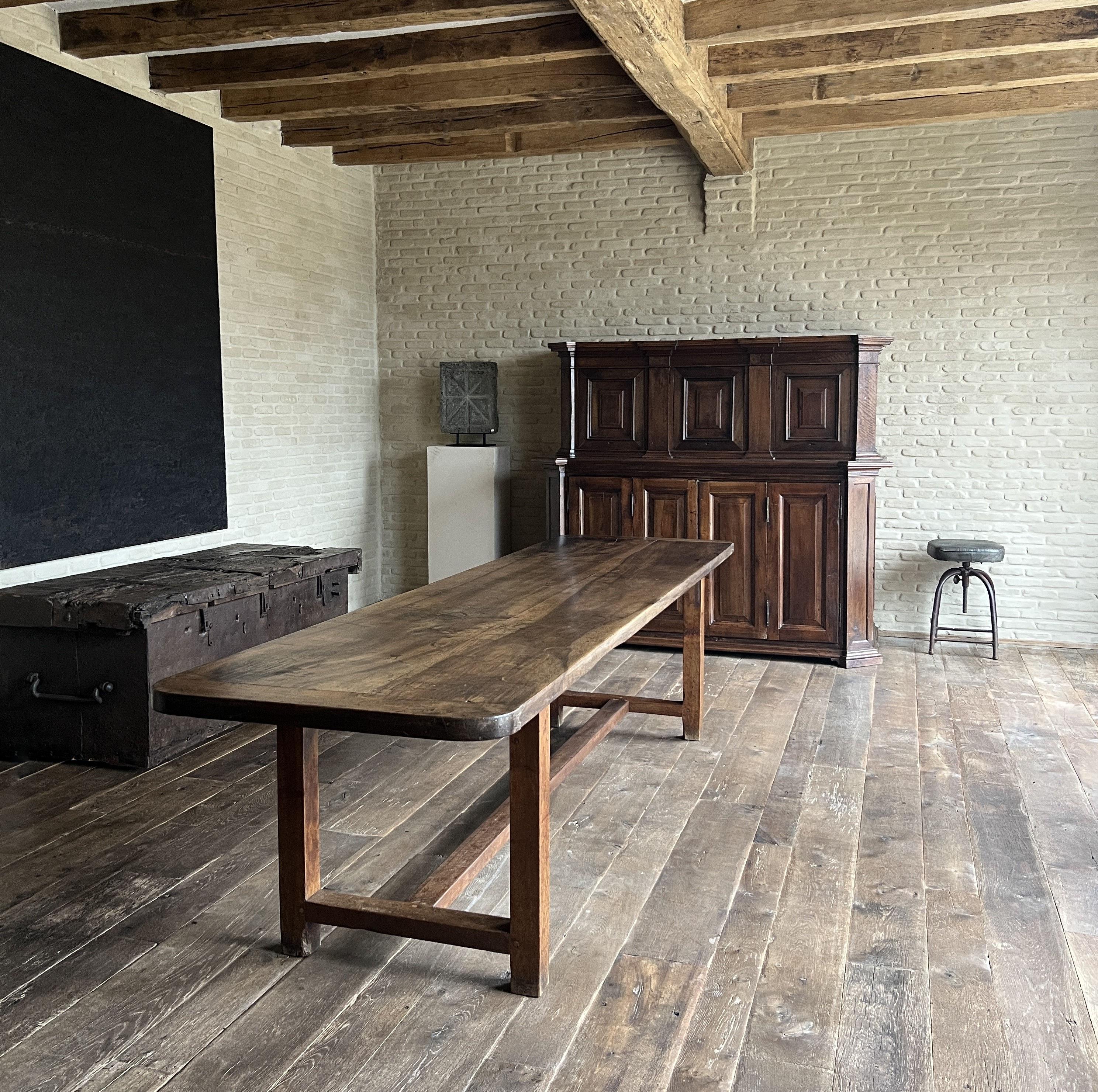 A great late 18th century Italian walnut refectory table with a exceptional two plank top. Beautiful proportions, great walnut with subtle patina. Verry sturdy and excellent dimensions.