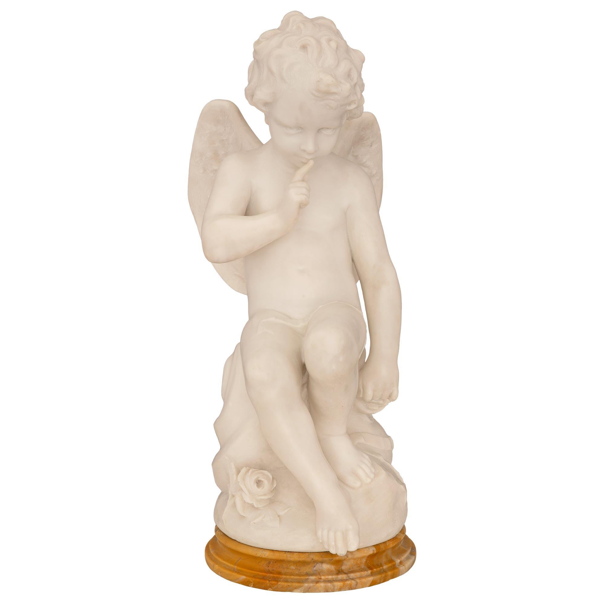 A beautiful and very high quality Italian late 19th century Trets and white Carrara marble statue by Pasquale Rizzoli. The statue, in the manner of Etienne Maurice Falconet (1716-1791), is raised by a most decorative circular Trets marble base with
