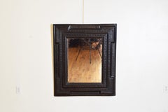 Italian Late Baroque Period Carved and Ebonized Guilloche Mirror, ca. 1700