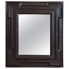 Italian Late Baroque Period Carved and Ebonized Guilloche Mirror, ca. 1700