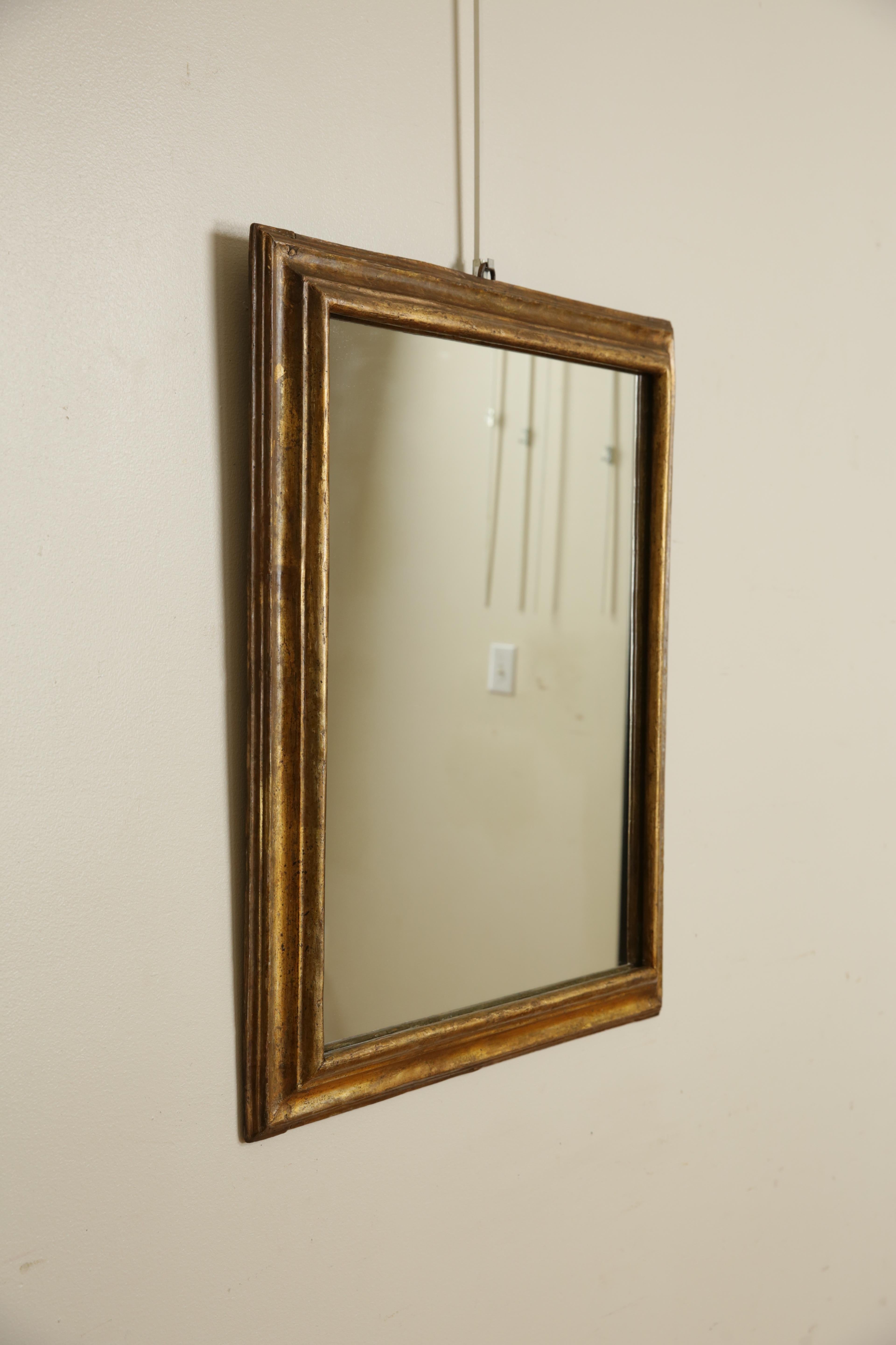 Italian, Late Baroque Period, Shaped Giltwood Wall Mirror, ca. 1700 In Good Condition In Atlanta, GA