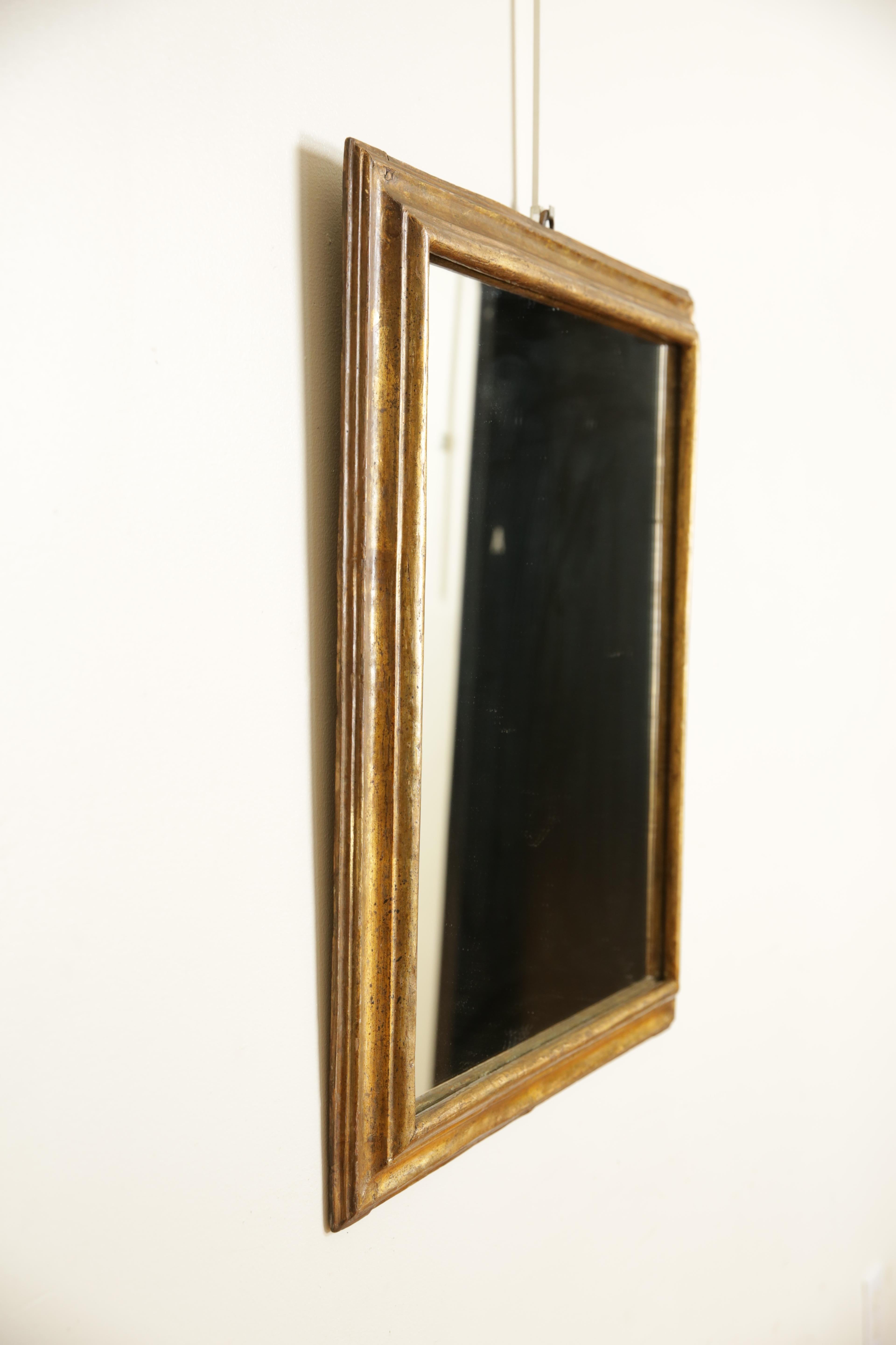 Early 18th Century Italian, Late Baroque Period, Shaped Giltwood Wall Mirror, ca. 1700