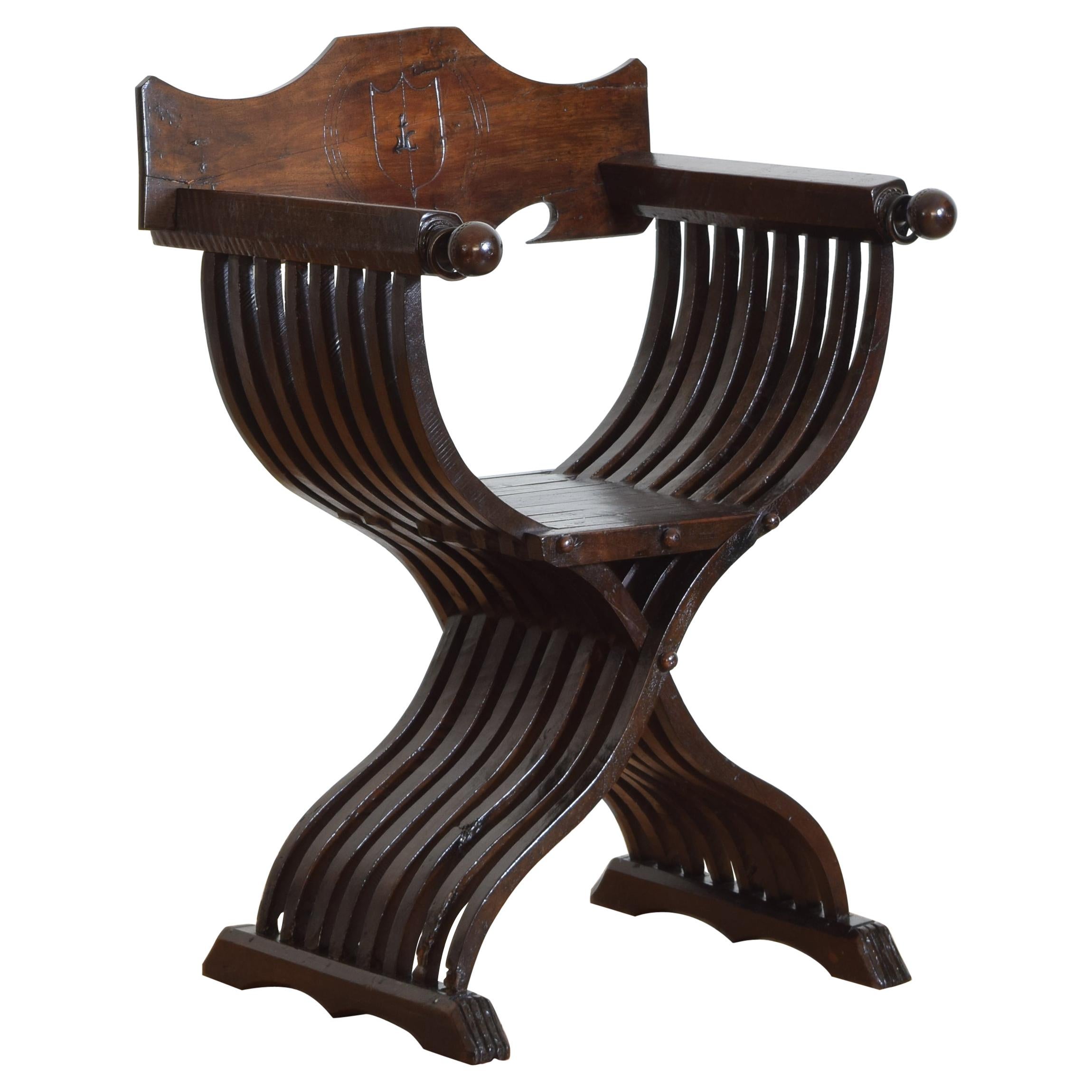 Italian Late Renaissance Walnut Folding Savonarola Chair, 17th Century