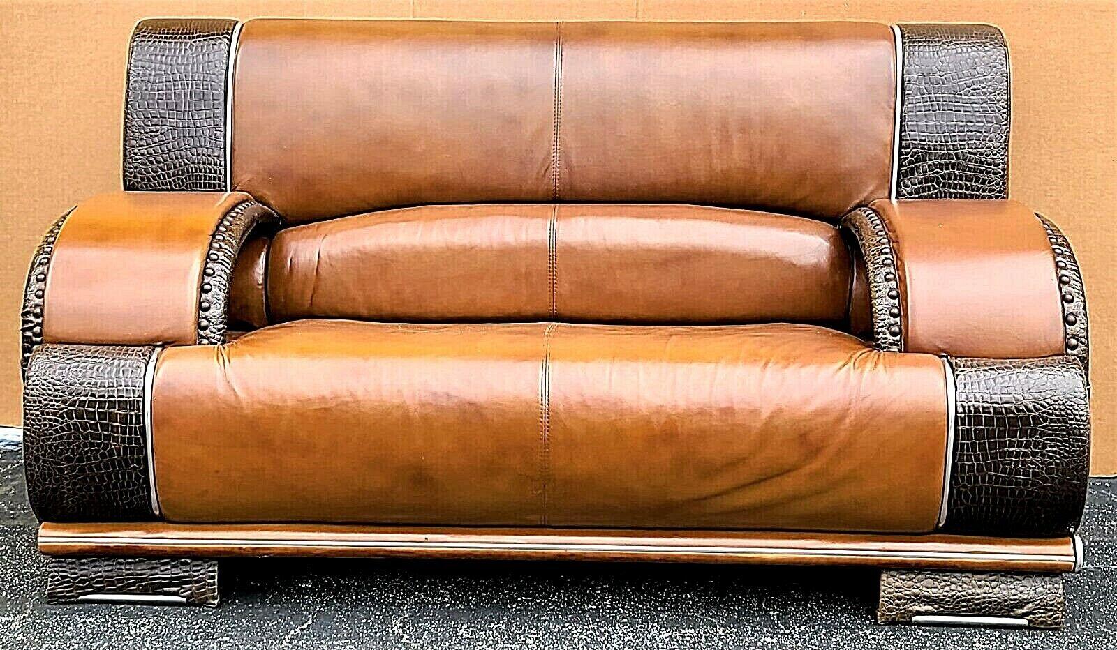 For FULL item description click on CONTINUE READING at the bottom of this page.

Offering one of our recent palm beach estate fine furniture acquisitions of an
exceptional and very comfortable vintage custom made leather and alligator settee