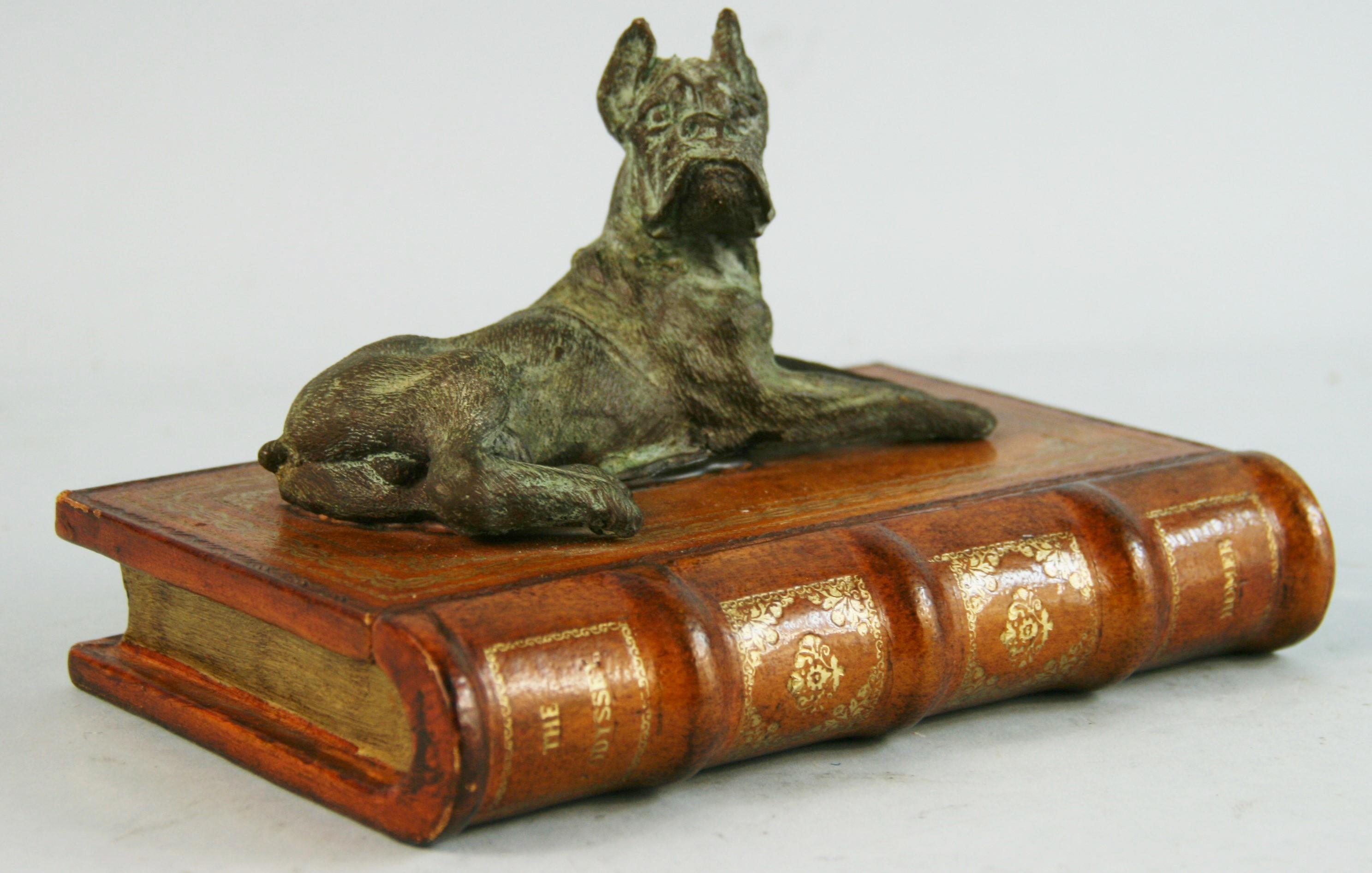 3-751 Italian leather bound book box with cast brass boxer dog as handle.
Beautiful and quirky item.