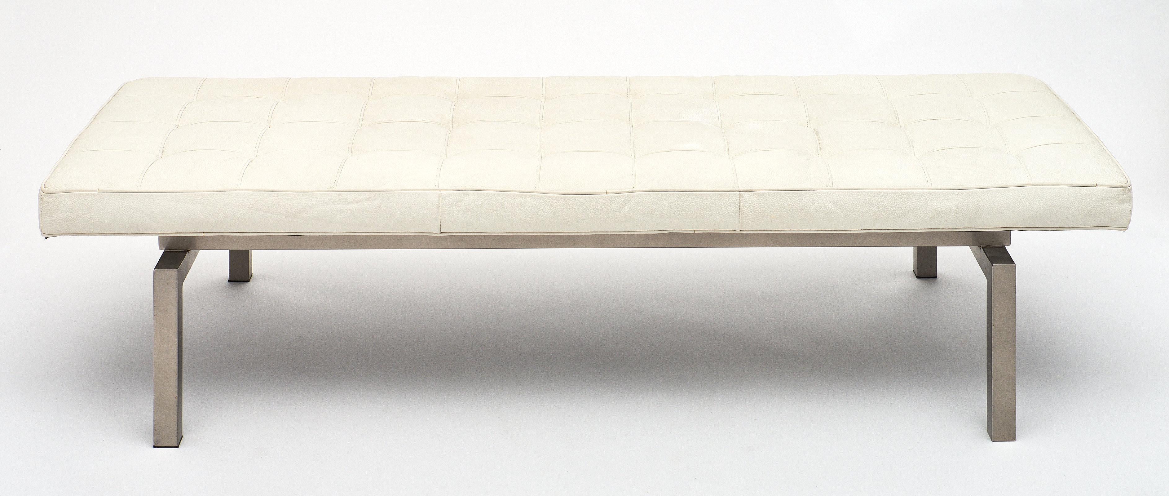 Contemporary Italian leather bench with chrome frame. The white Italian leather is in excellent condition and very comfortable. We love the large scale and the strong modern lines of this piece!