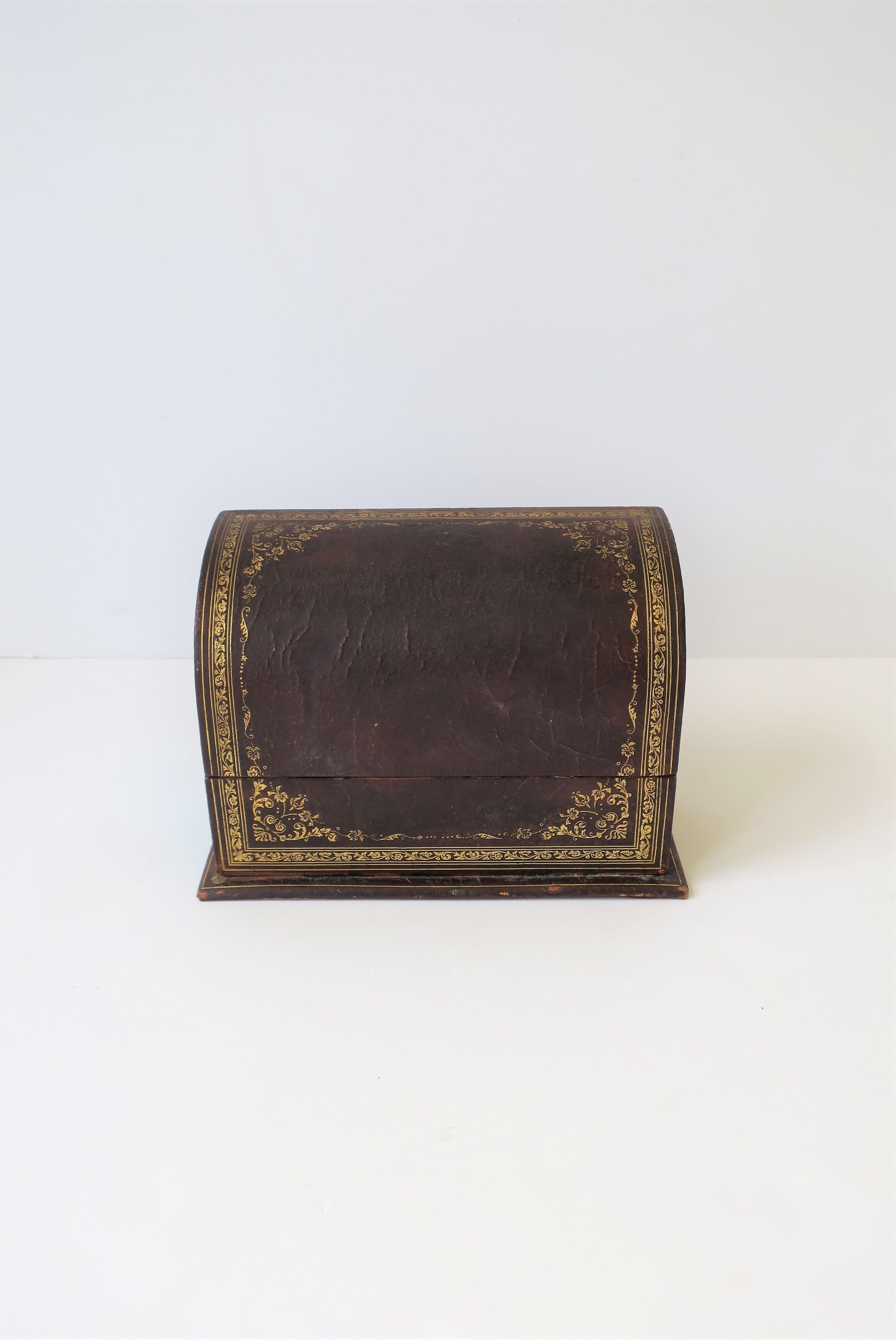 A vintage Italian leather Desk letter holder box with gold embossing, circa early to mid-20th Century, Italy.

Box measures: 4.5
