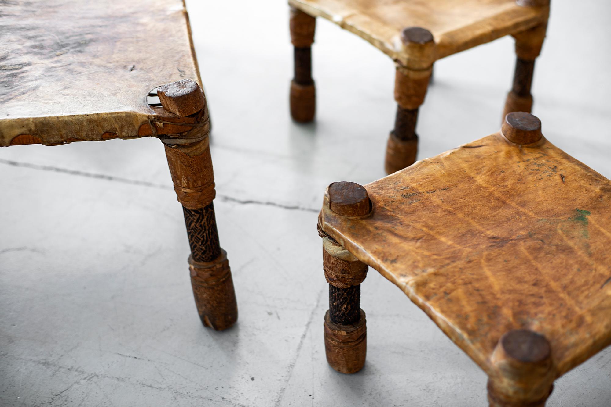 African Leather Table and Stools 1