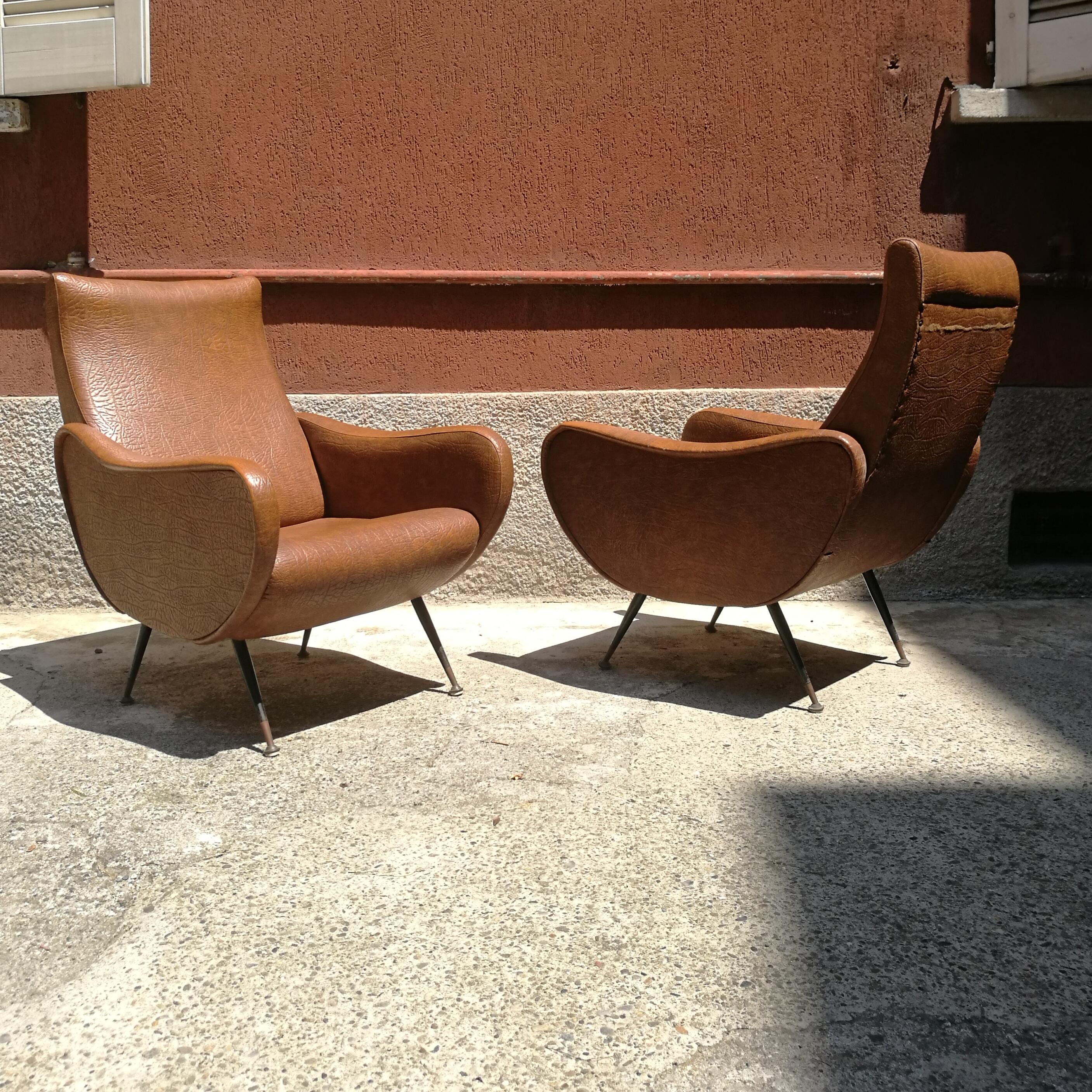 Italian leatherette armchairs from 1950s, in the style of Lady armchair by Marco Zanuso
Couple of Italian brown leatherette armchairs from fifties, in the style of lady armchair by Marco Zanuso. Structured with their original filling and covered