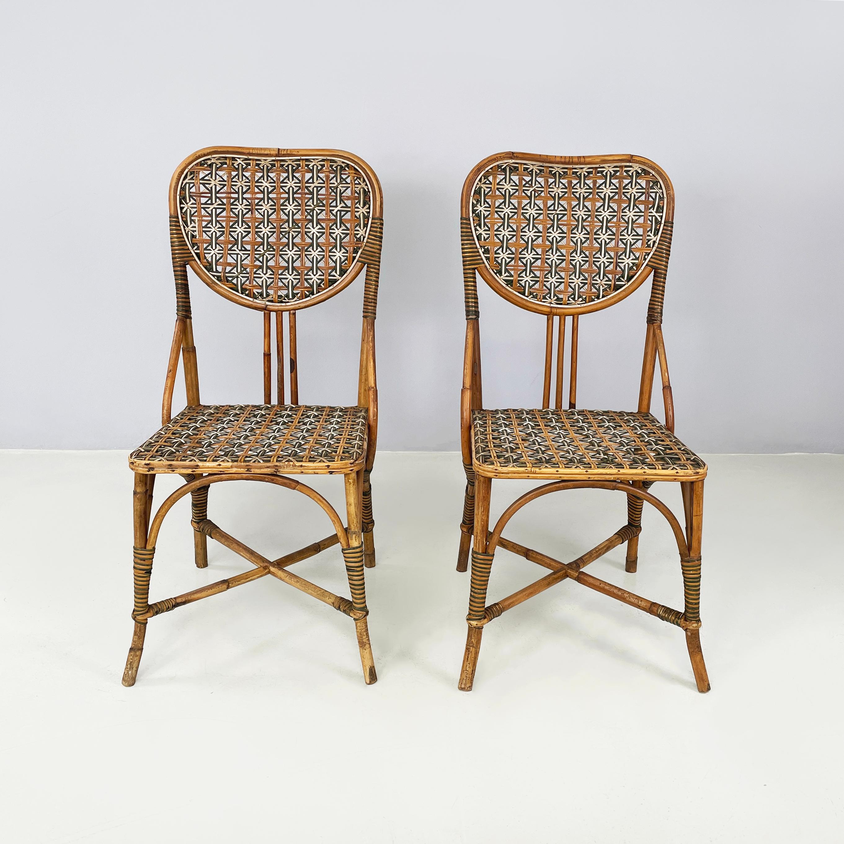 Italian Liberty outdoor chairs in rattan from Palazzo Falconi, early 1900s
Pair of  vintage outdoor chairs entirely in woven rattan. The rounded backrest is in rattan with brown, white and green wicker weaves with star patterns. The seat has the