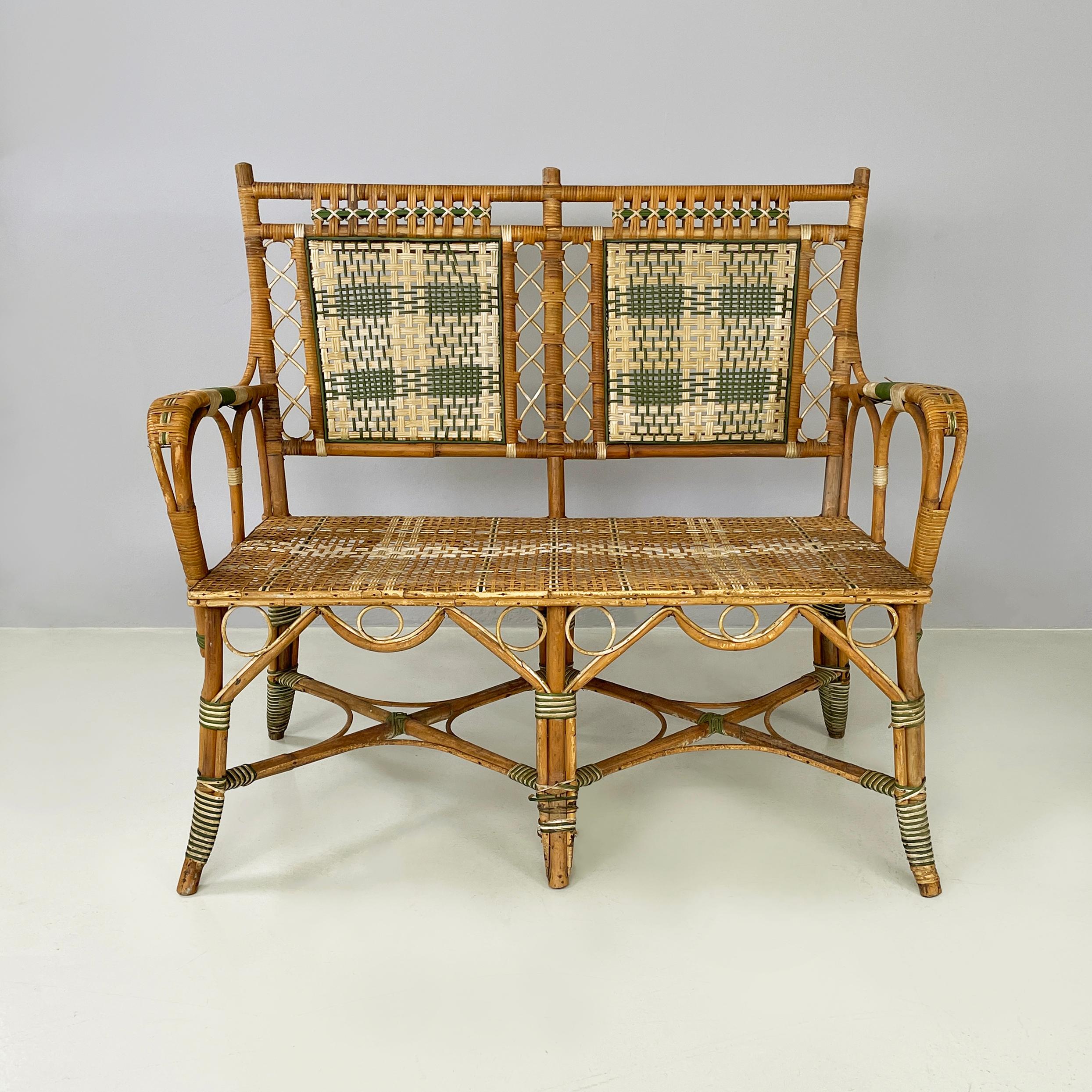 Italian Liberty Two-seater outdoor bench in rattan from Palazzo Falconi, early 1900s
Two-seater outdoor bench entirely in woven rattan. The backrest is in rattan with brown, white and green wicker weaves finely woven with rectangular patterns. The