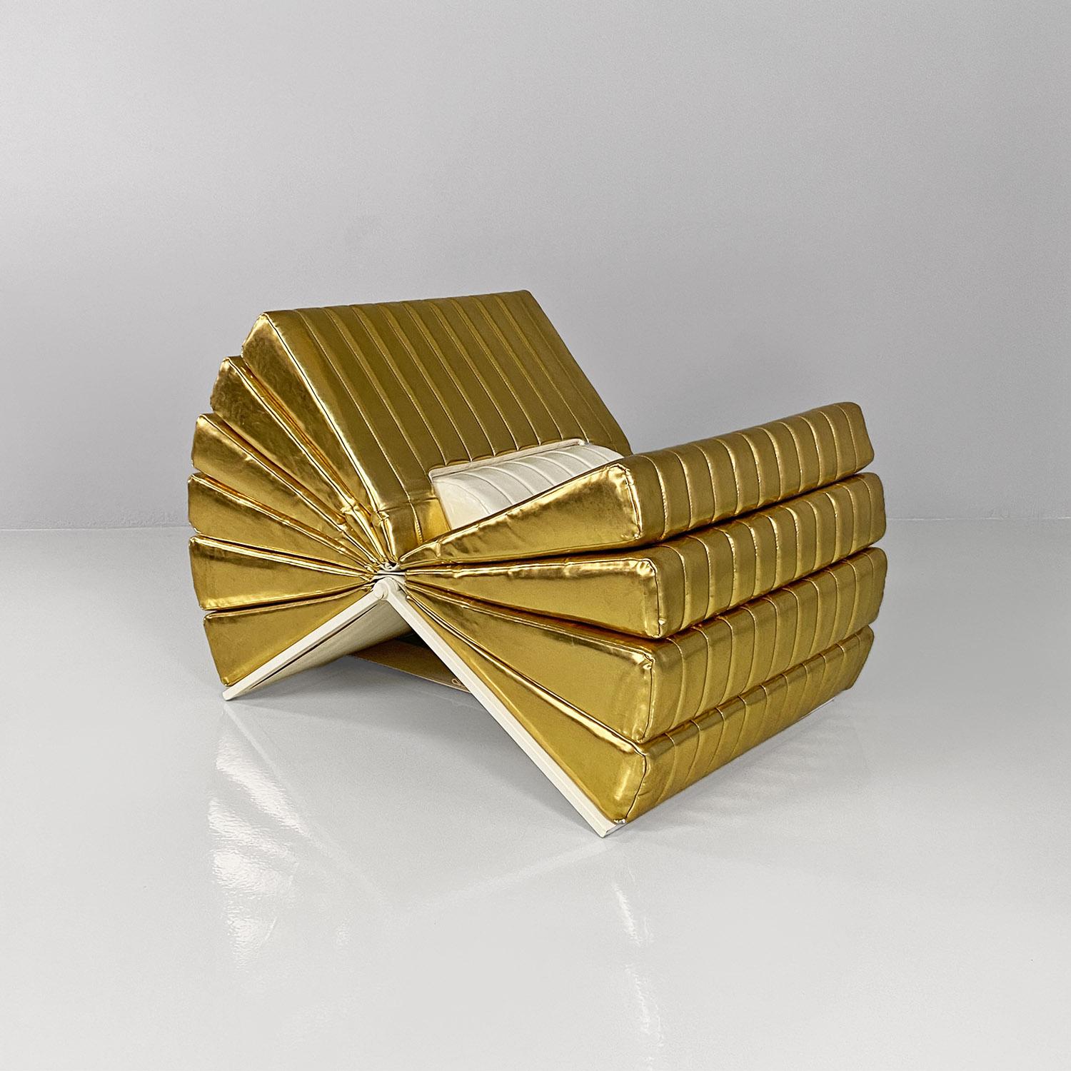 Italian Libro armchair Gianni Pareschi Umberto Orsini DAM Group x Busnelli 2000s.
Libro model armchair with load-bearing structure in cream-white painted metal, articulated in the center to support the vinyl seat pages, which you can browse until