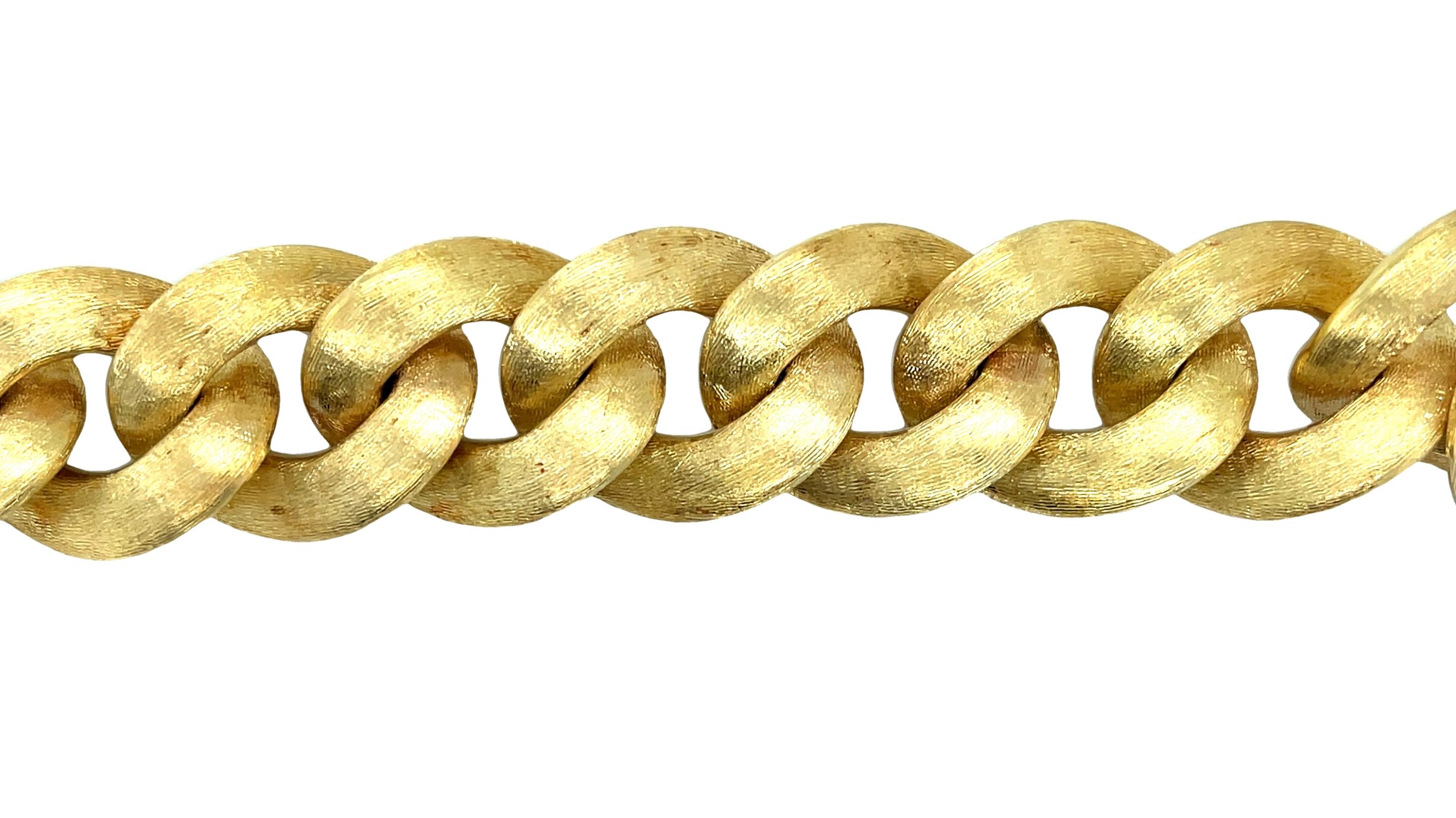 This eye-catching 18k yellow gold Italian link bracelet is an impressive statement of high fashion and quality! Stunning, 20mm wide links have elegant contouring and a gorgeous Florentine brushed finish that will make you feel wrapped in luxury!