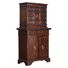 Italian, Lombardia, Baroque Walnut 
Inlaid 14 Drawer Monetiere Cabinet, 17thc