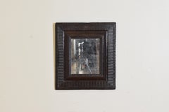 Italian, Lombardia, Small Ebonized Walnut Guilloche Mirror, mid 17th century