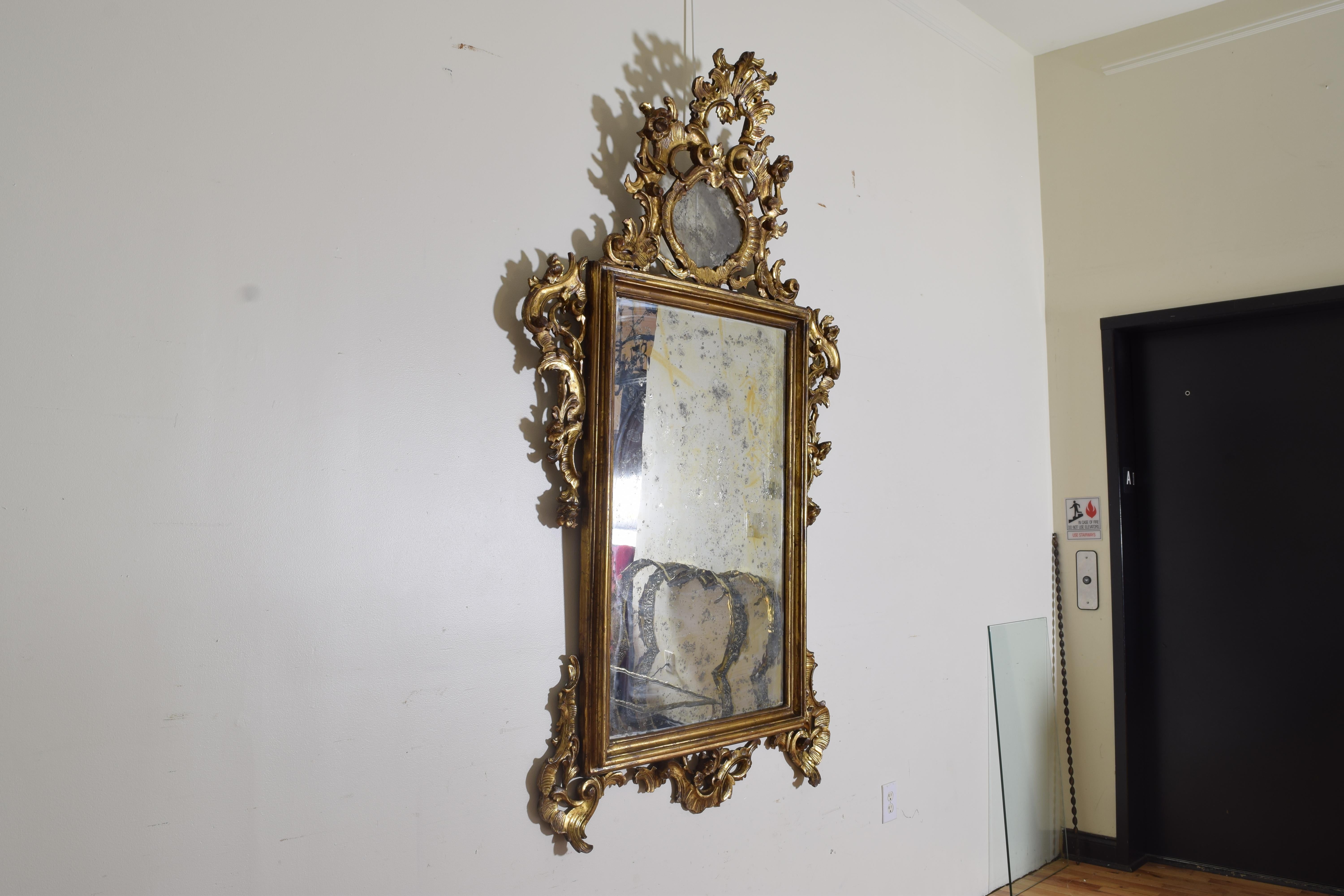 Italian Louis XIV Period Large Carved Giltwood Mirror, Early 18th Century In Good Condition In Atlanta, GA
