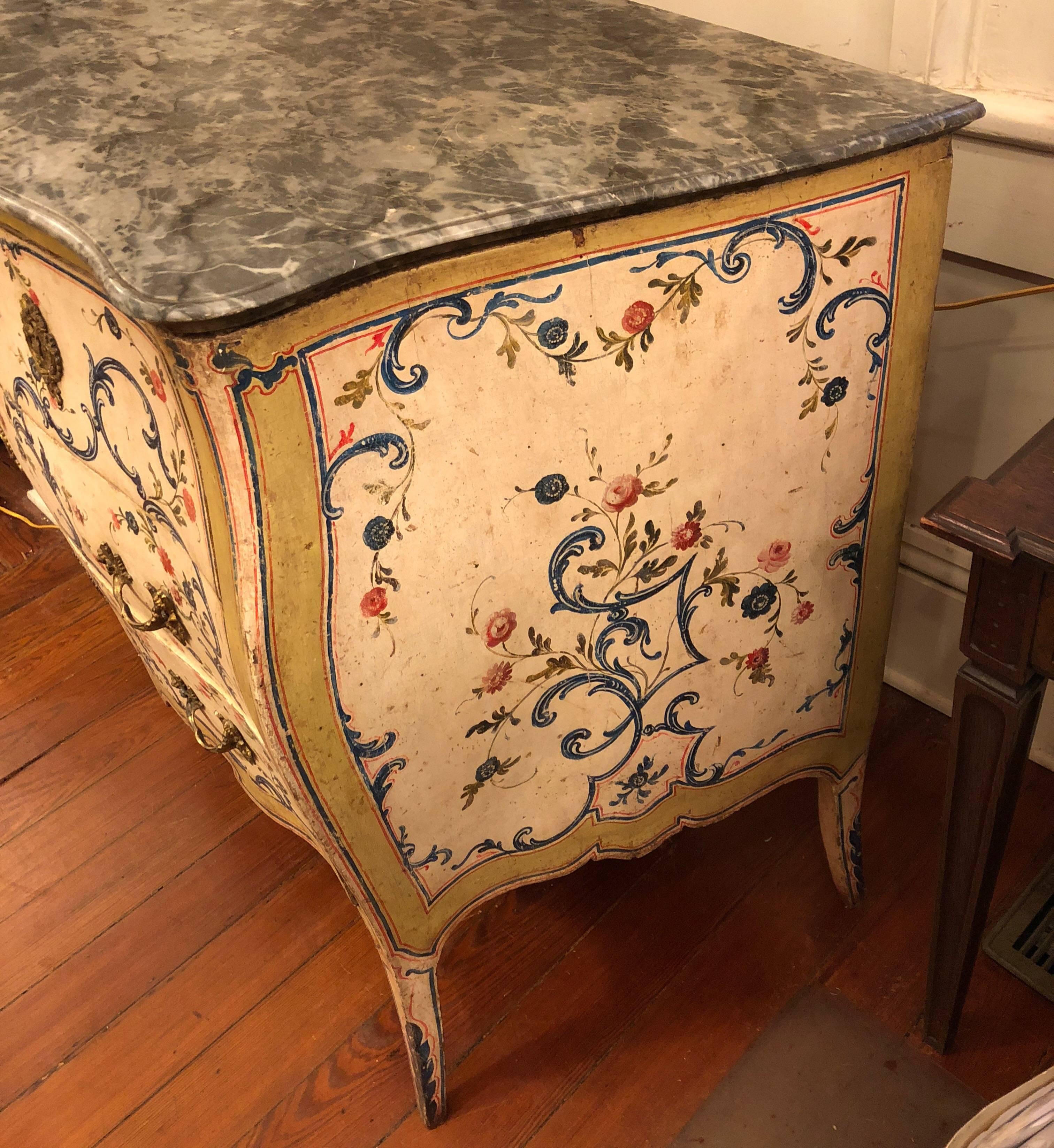 Exceptional painted Italian marble topped commode from Genoa, Italy. The paint is all original and the hardware appears to be original as well. Some of the gilt on hardware is worn significantly. Paint has remarkably little wear. This commode came