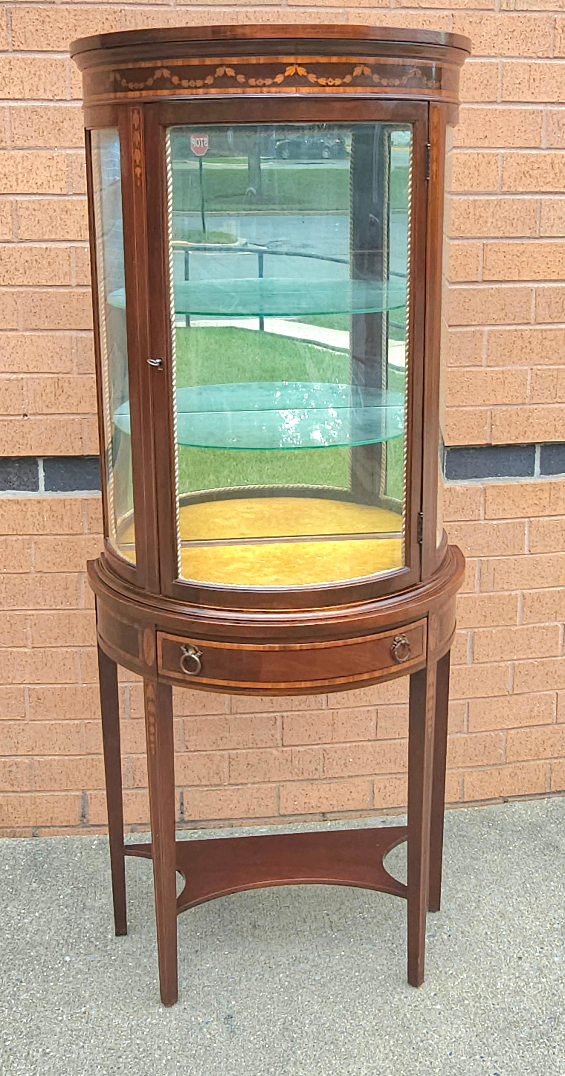 Italian Louis XV Style Marquetry Inlaid Mahogany Vitrine Cabinet. Two adjustable height glass shelves. Yellow Velvet floor. 
Perfect for small as well as for large spaces.
Measures 25