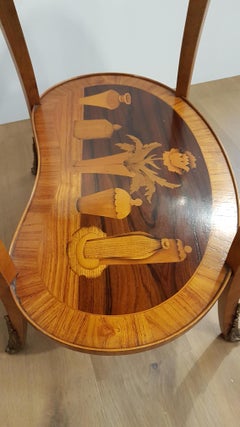 Oval table in Louis XVI style with rich inlay in rosewood and bronzes  1950s